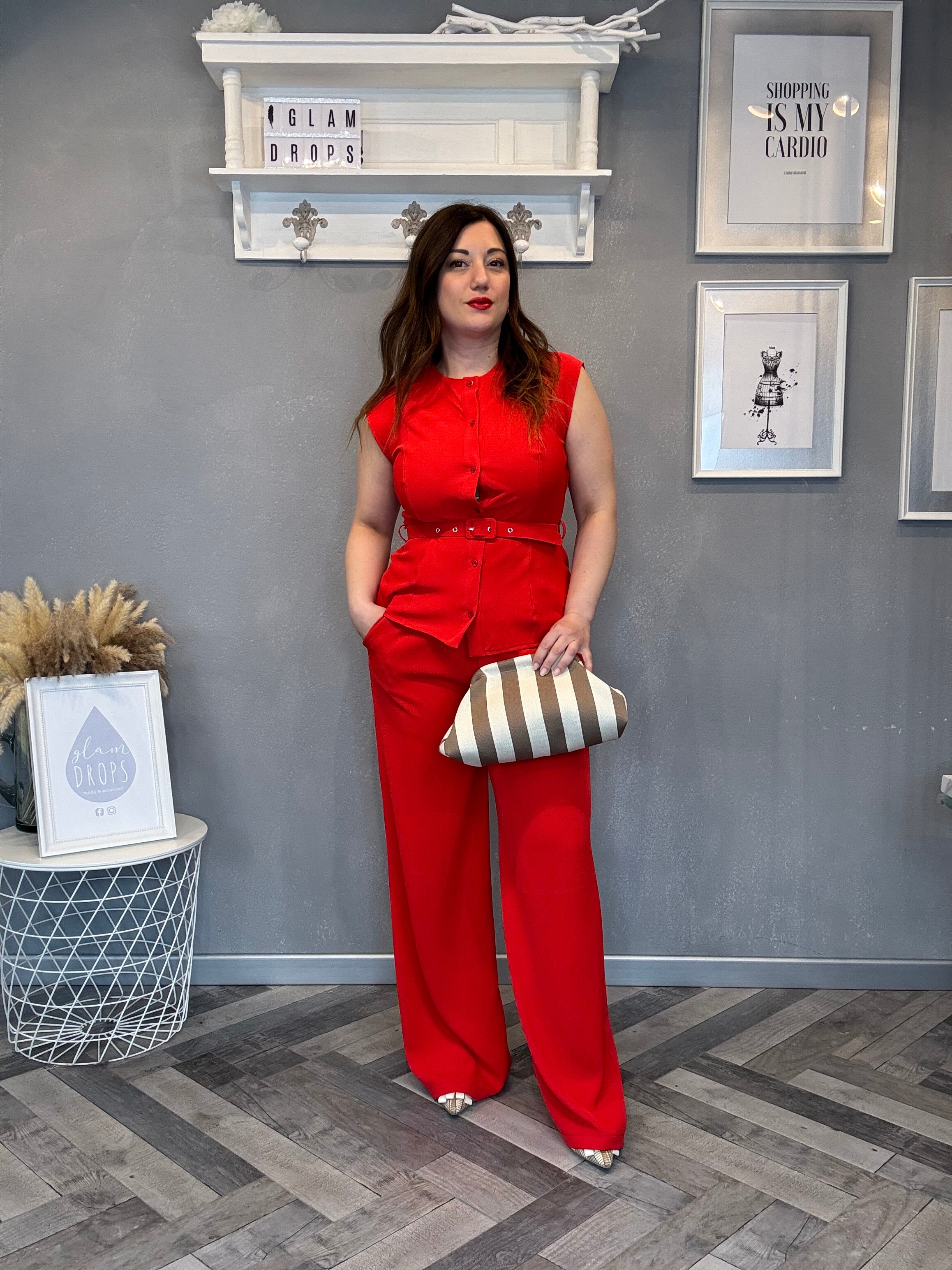 Coordinato smanicato con pantalone palazzo