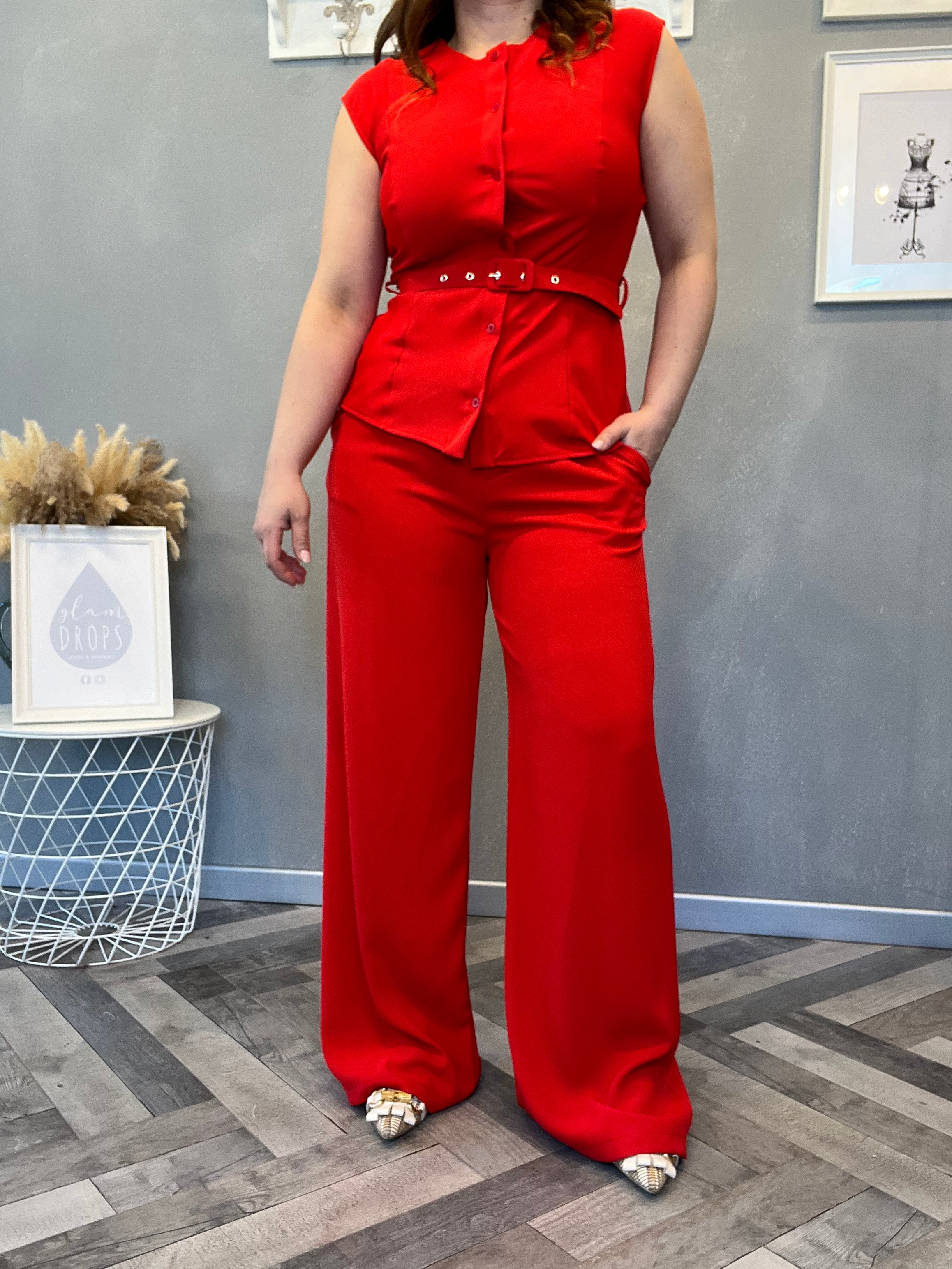 Coordinato smanicato con pantalone palazzo