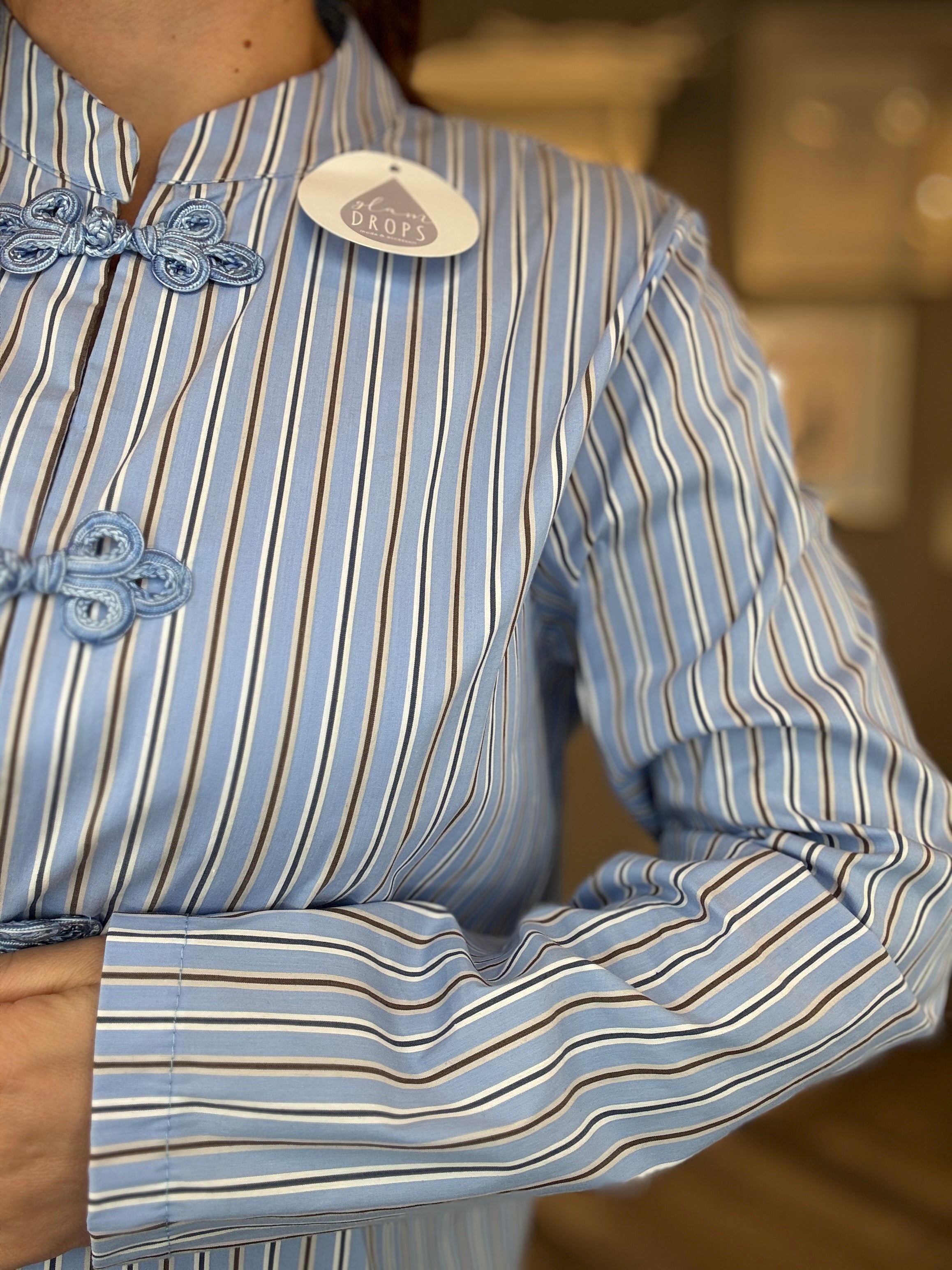 Camicia alamari celeste a righe