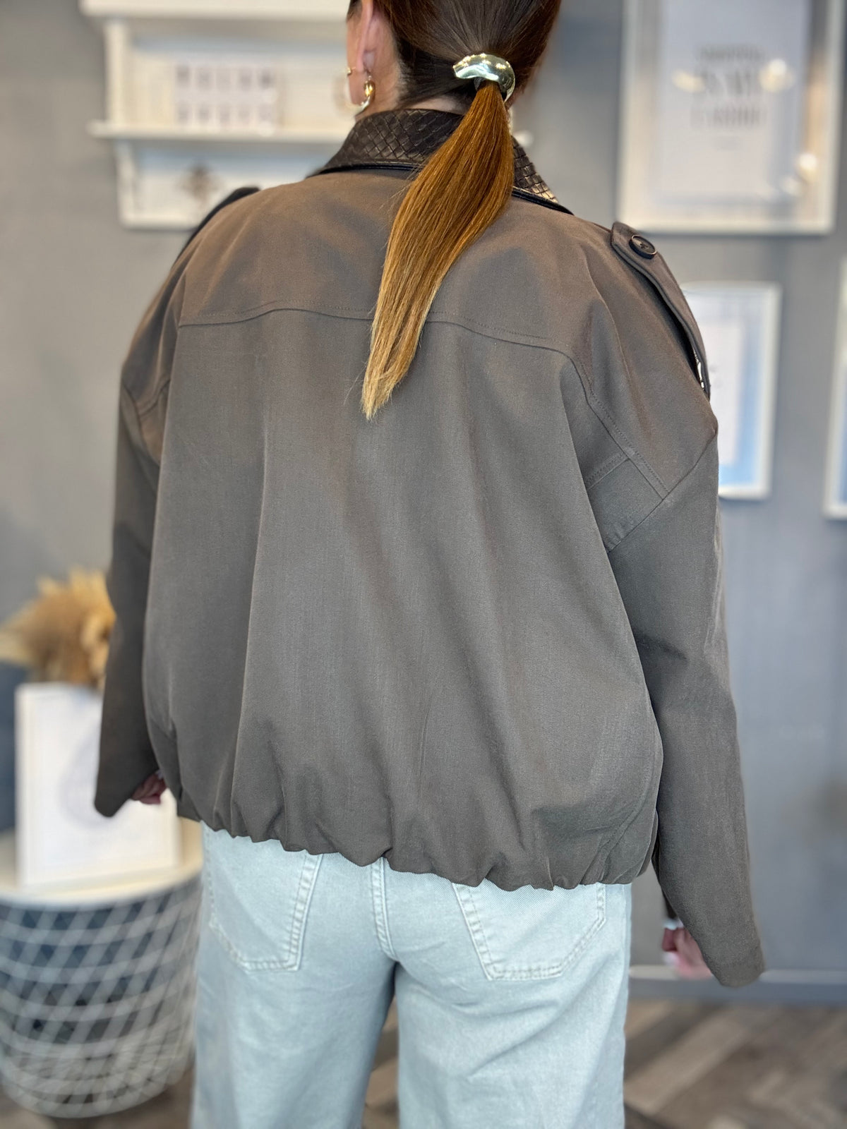 Bomber collo intrecciato fango