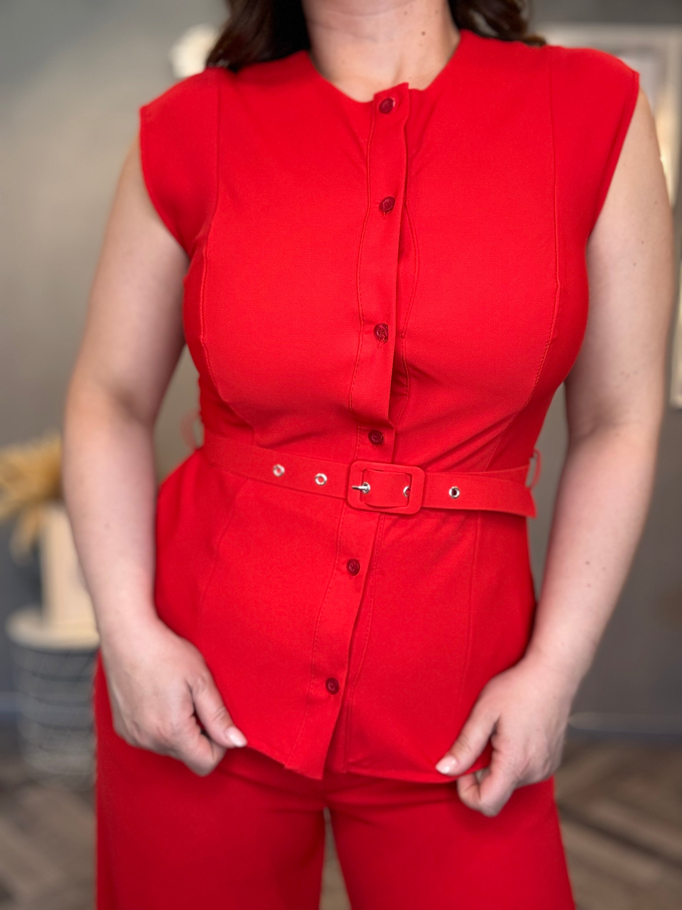 Coordinato smanicato con pantalone palazzo