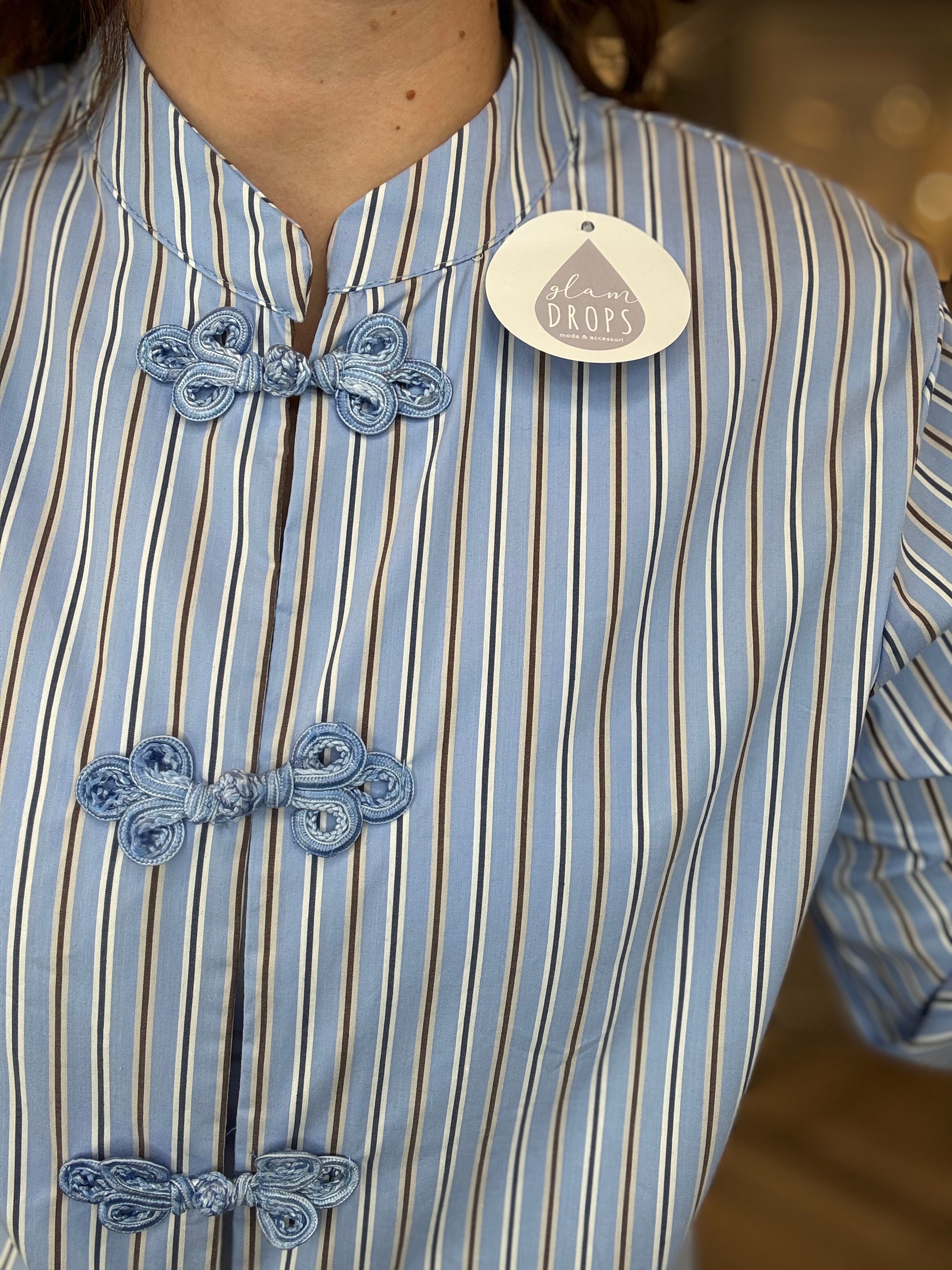 Camicia alamari celeste a righe