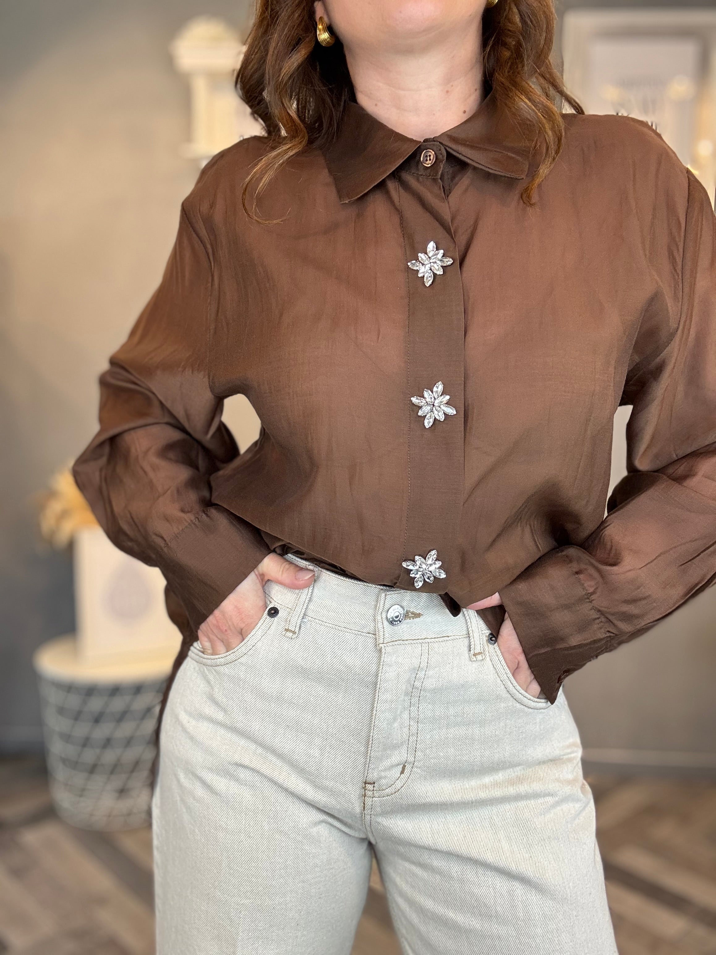 Jeans sabbiato con risvolto