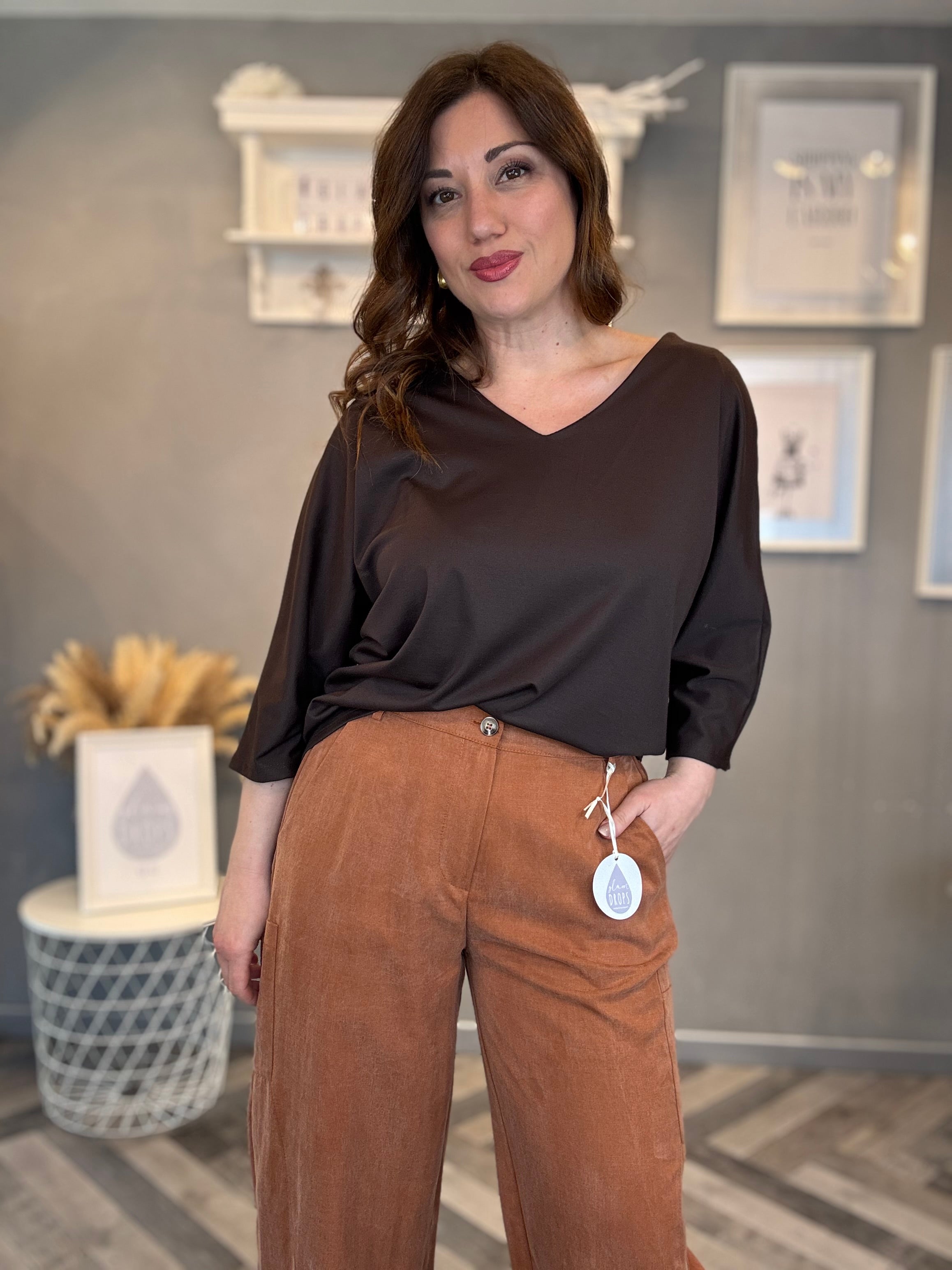 Maglia con fiocco sul retro moro