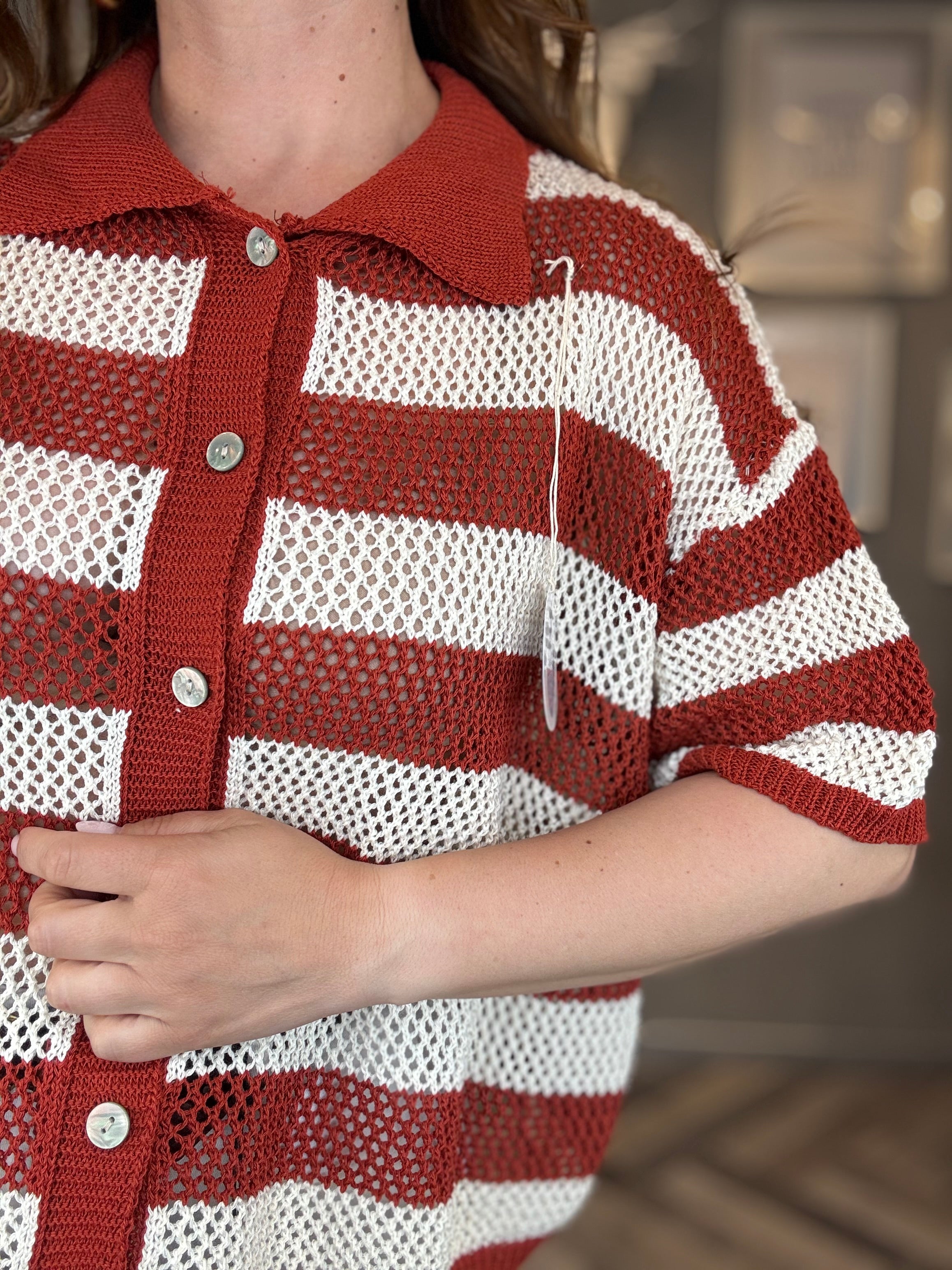 Polo traforata righe ruggine