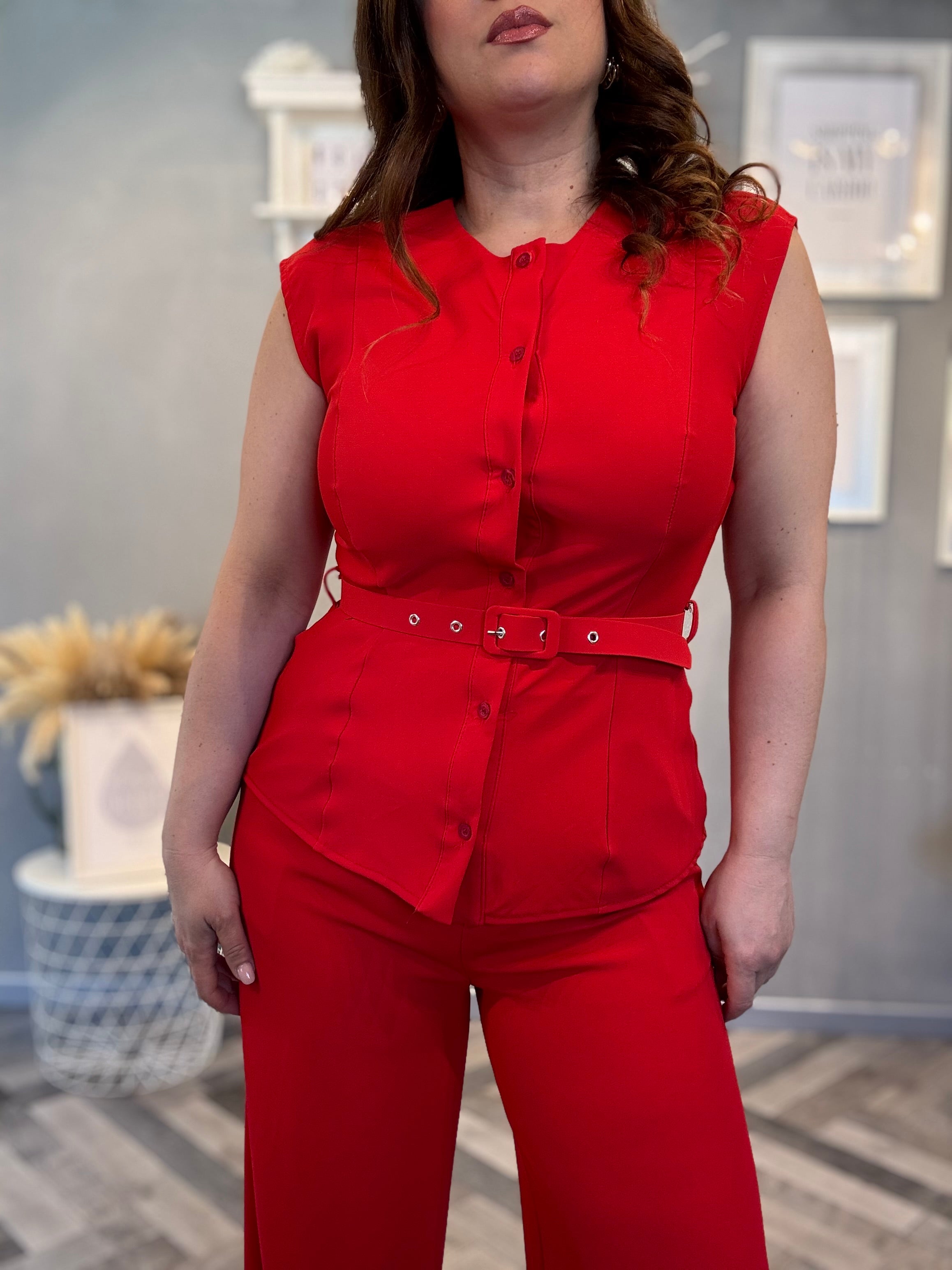 Coordinato smanicato con pantalone palazzo