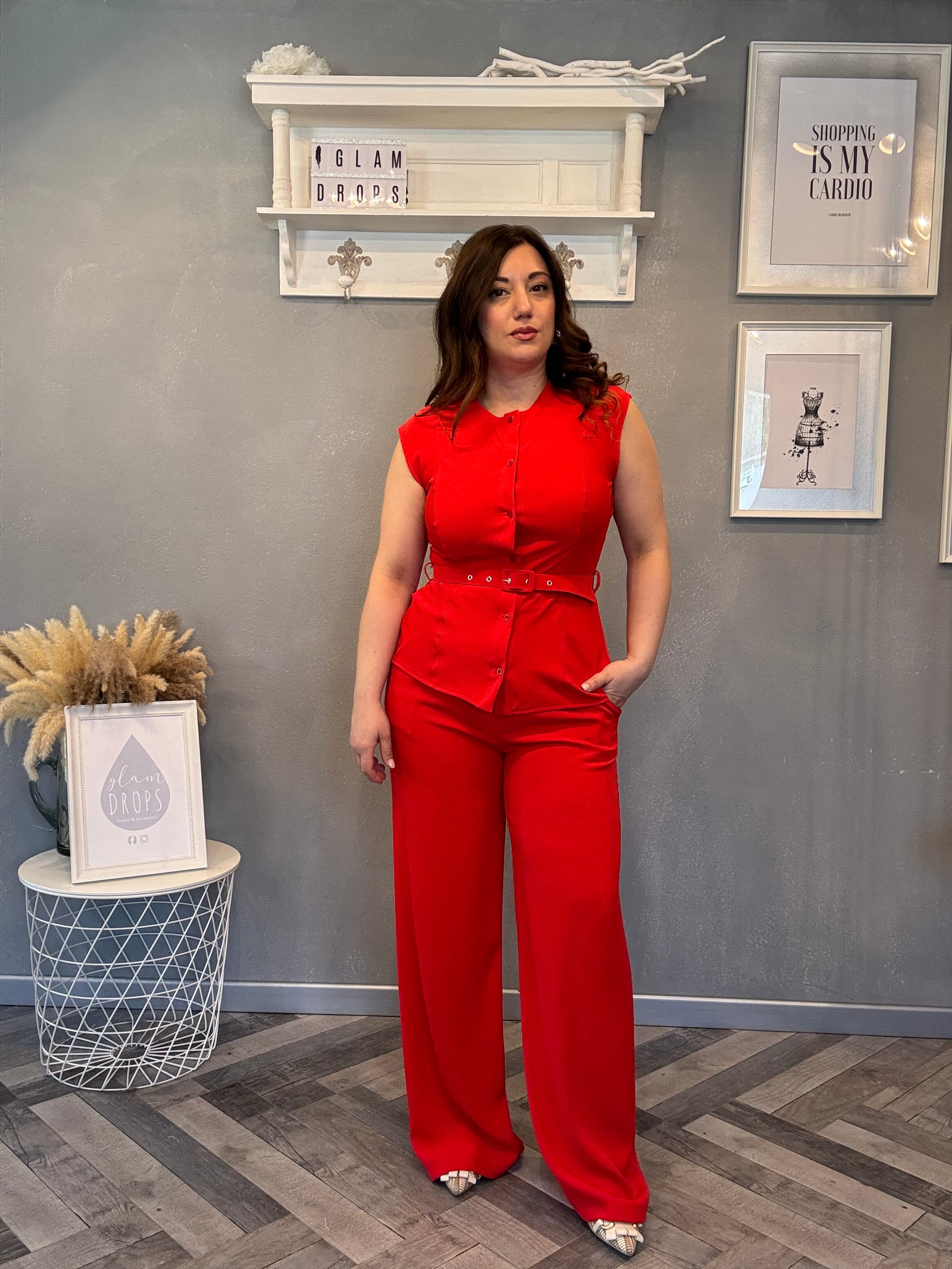 Coordinato smanicato con pantalone palazzo