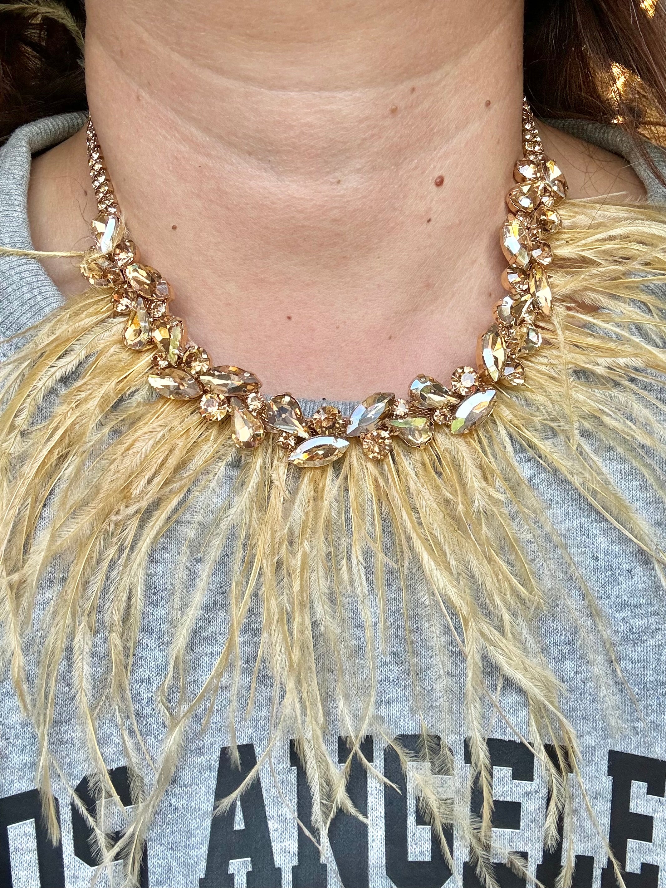 Collana piume e pietre