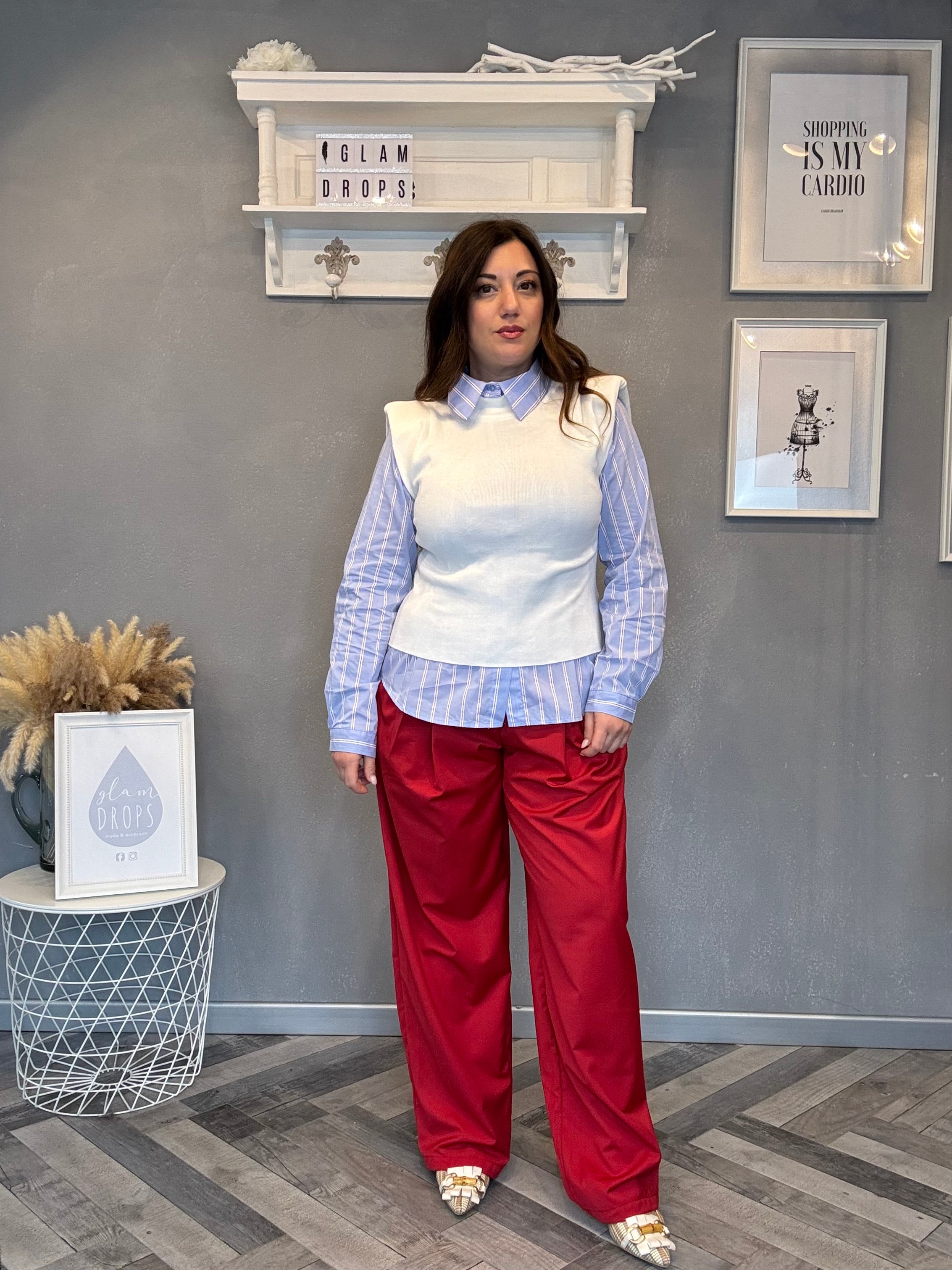 Top smanicato con spalline