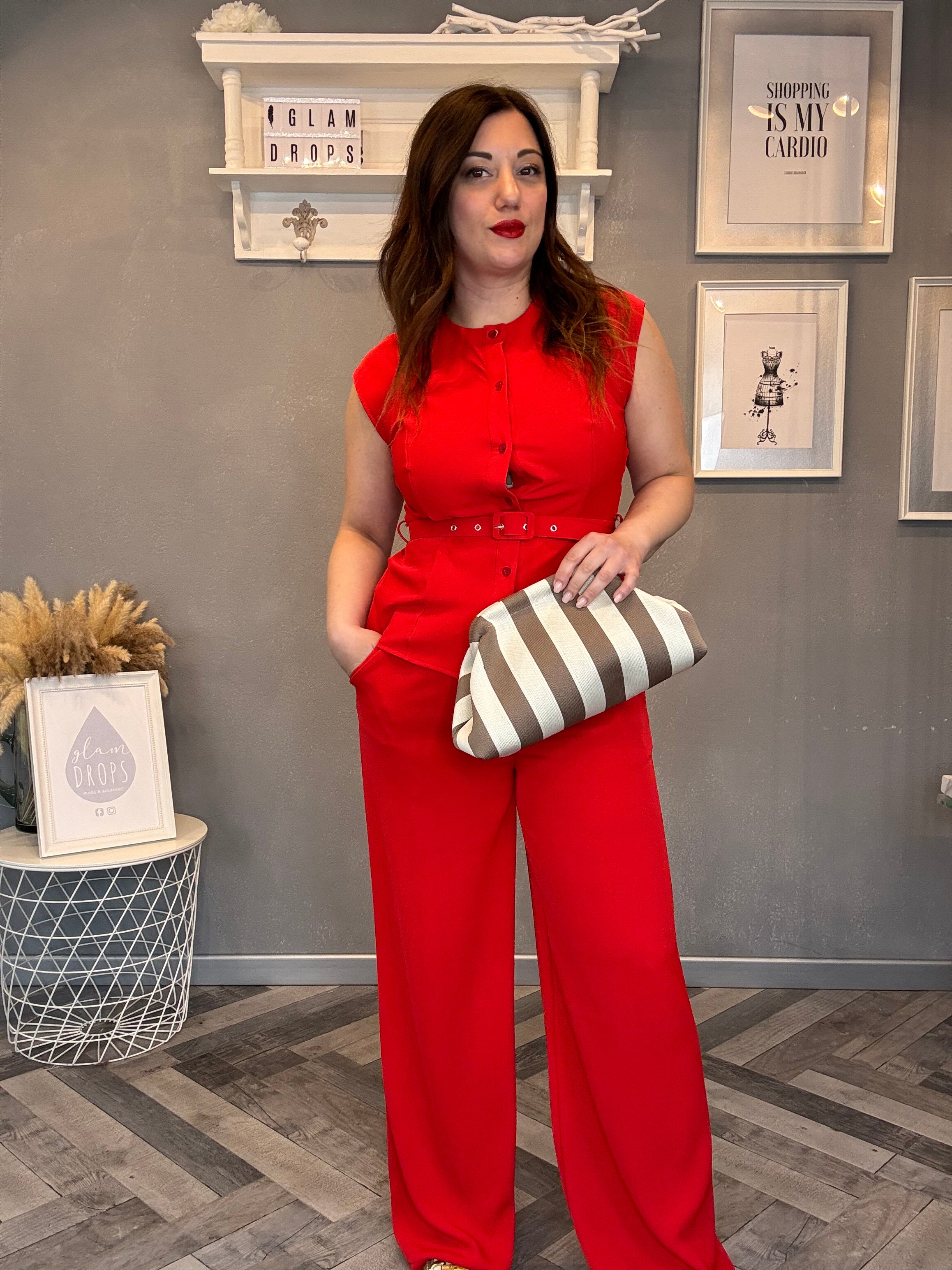 Coordinato smanicato con pantalone palazzo