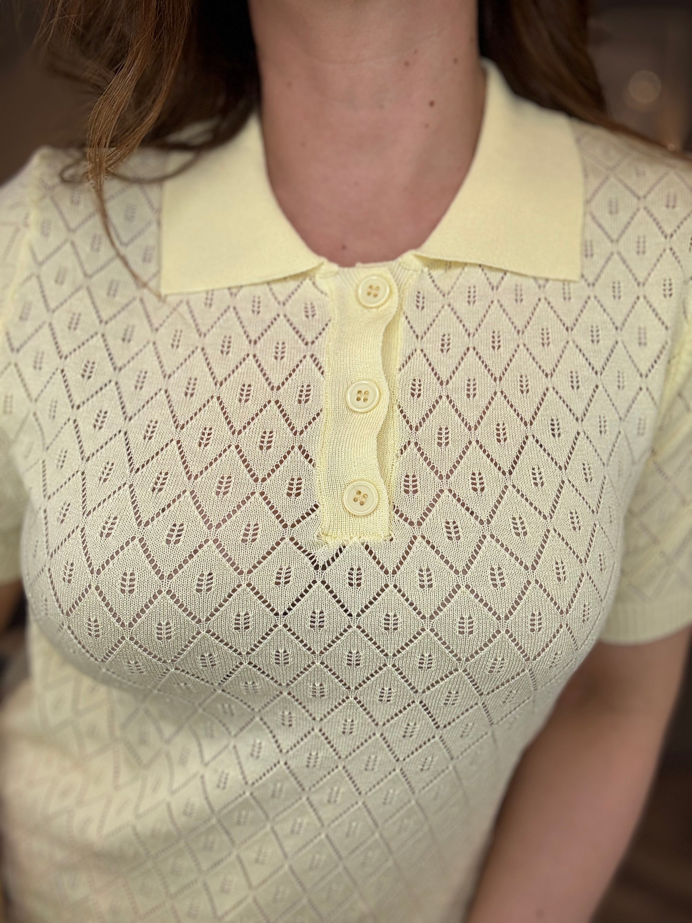 Polo traforata giallo pastello
