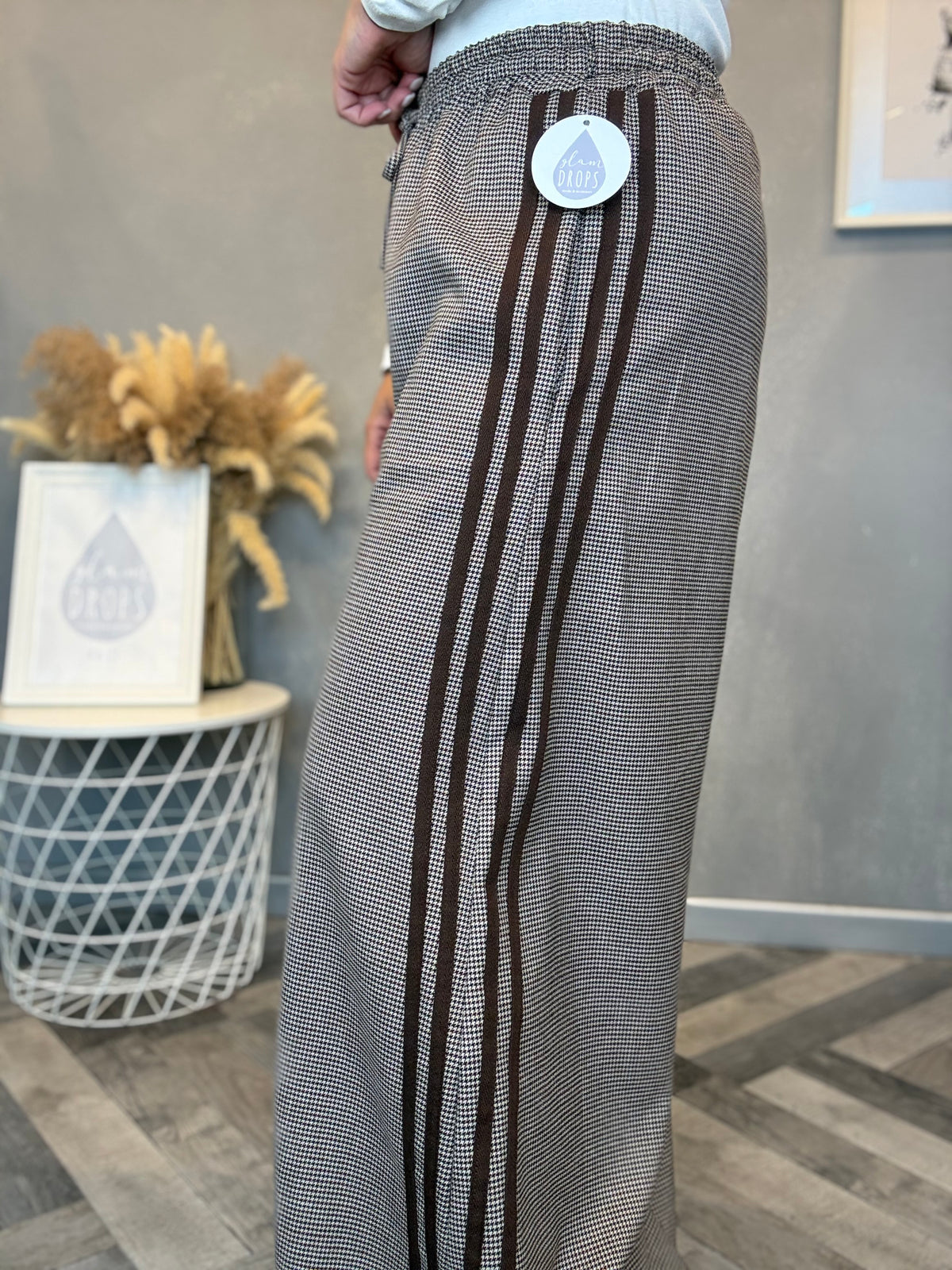 Pantalone palazzo check con bande laterali