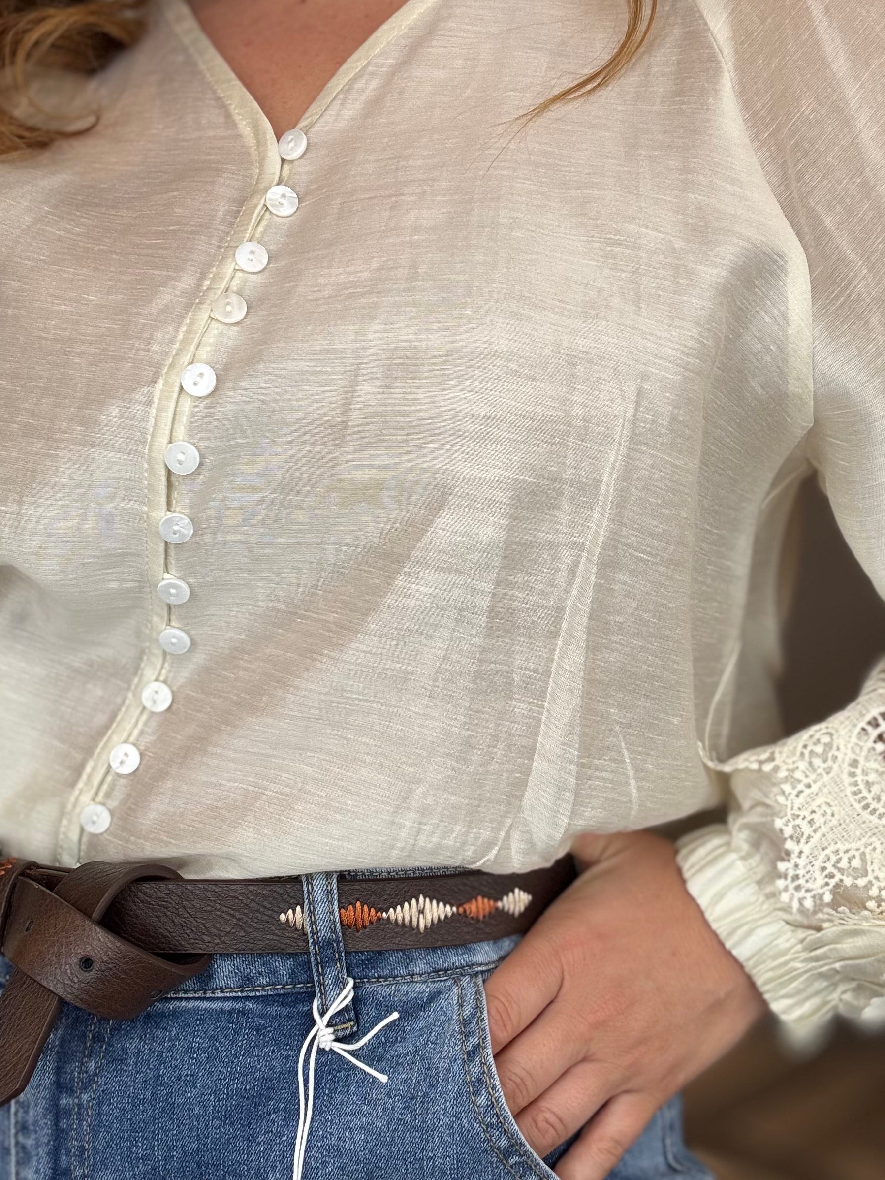 Jeans con cintura ricamata