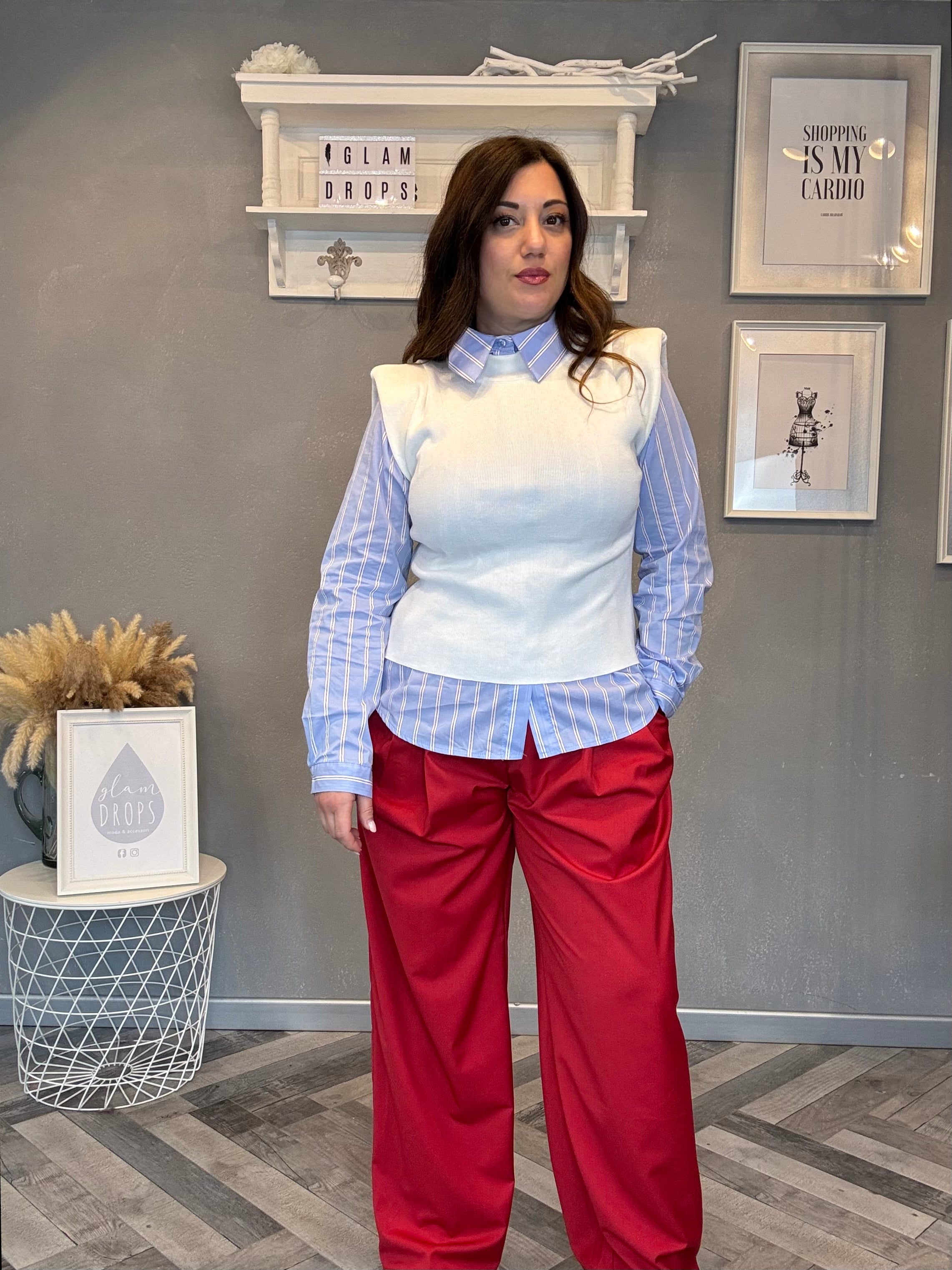 Top smanicato con spalline