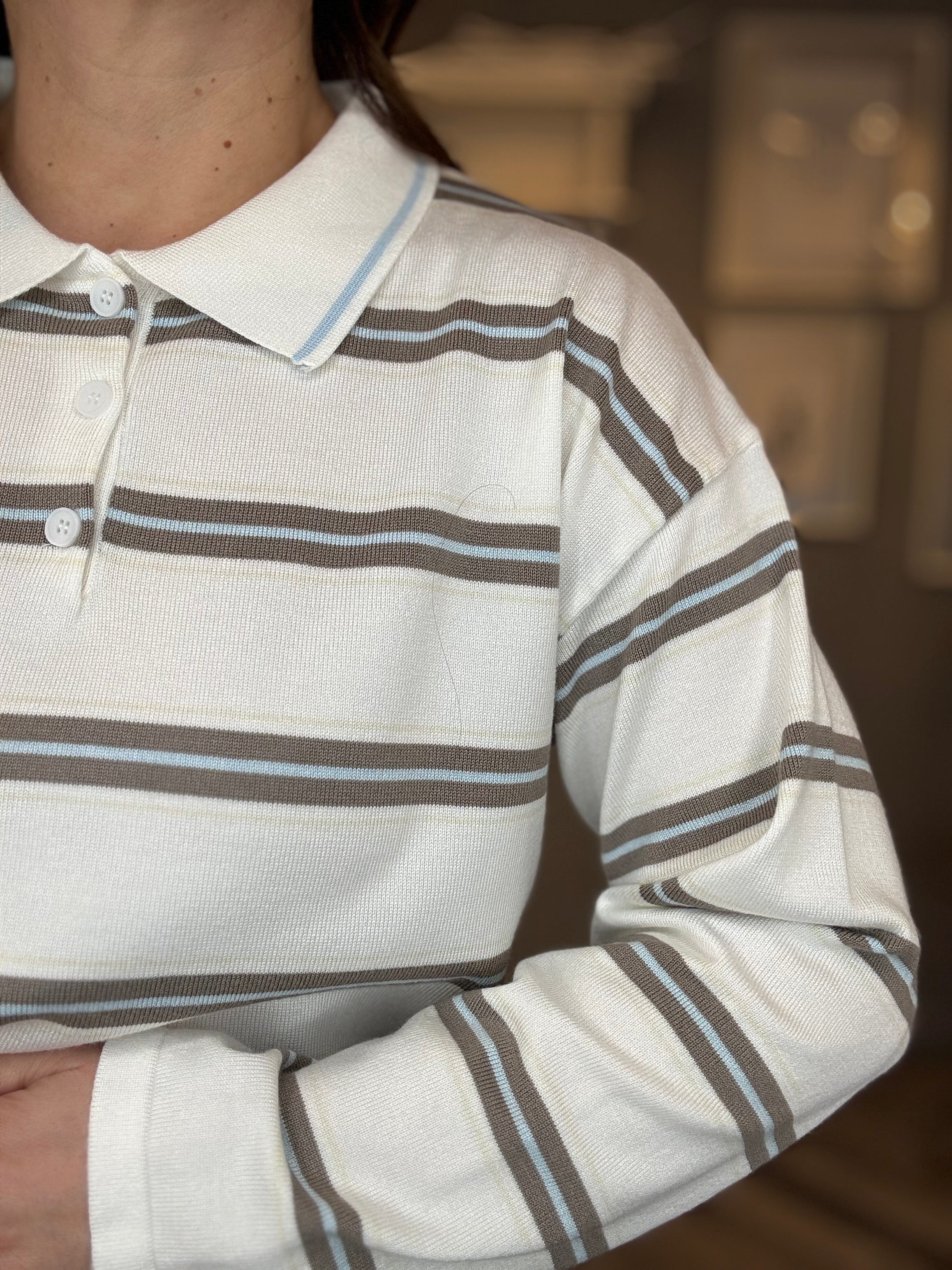 Maglia polo bianca a righe celesti