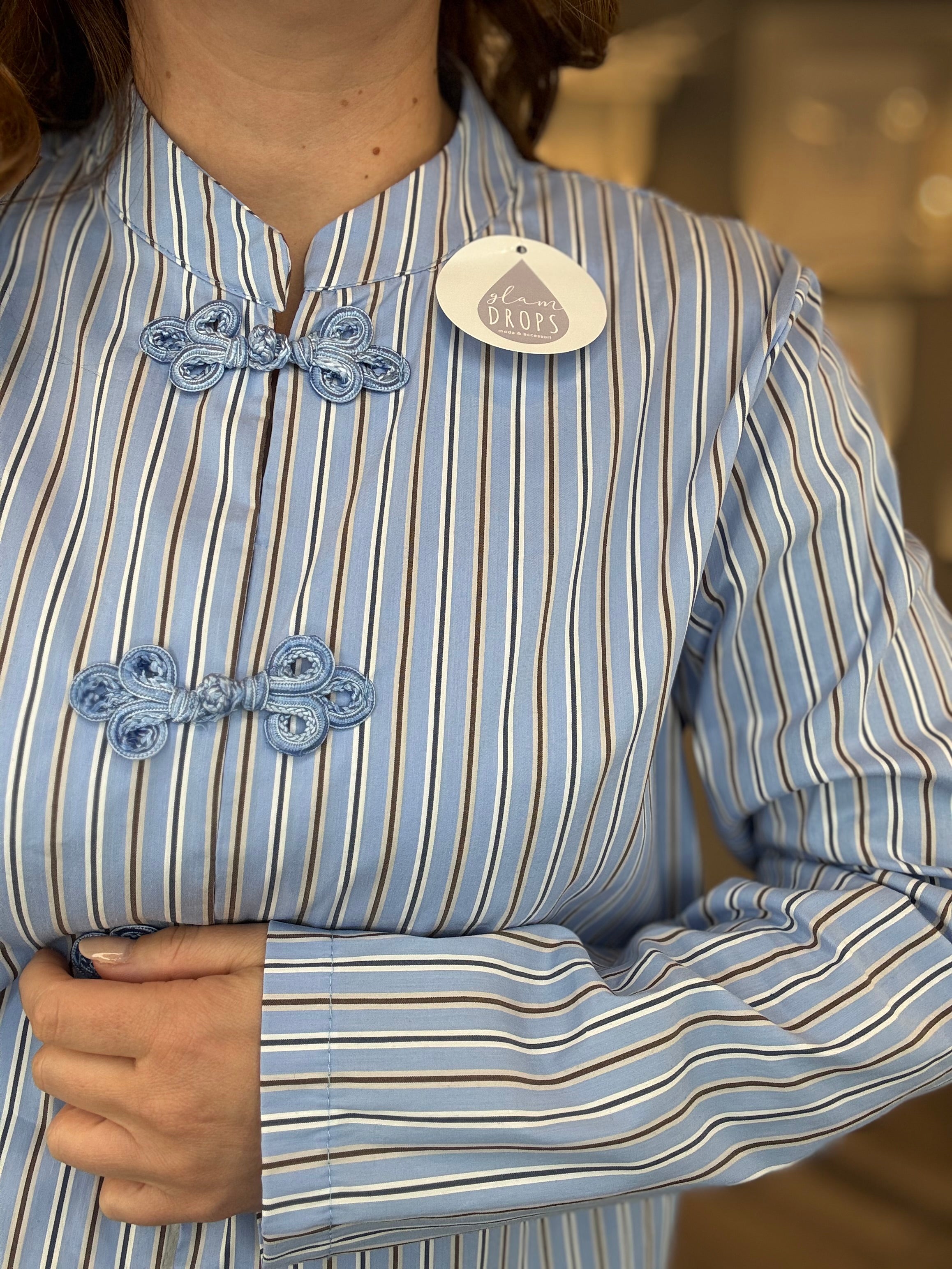 Camicia alamari celeste a righe