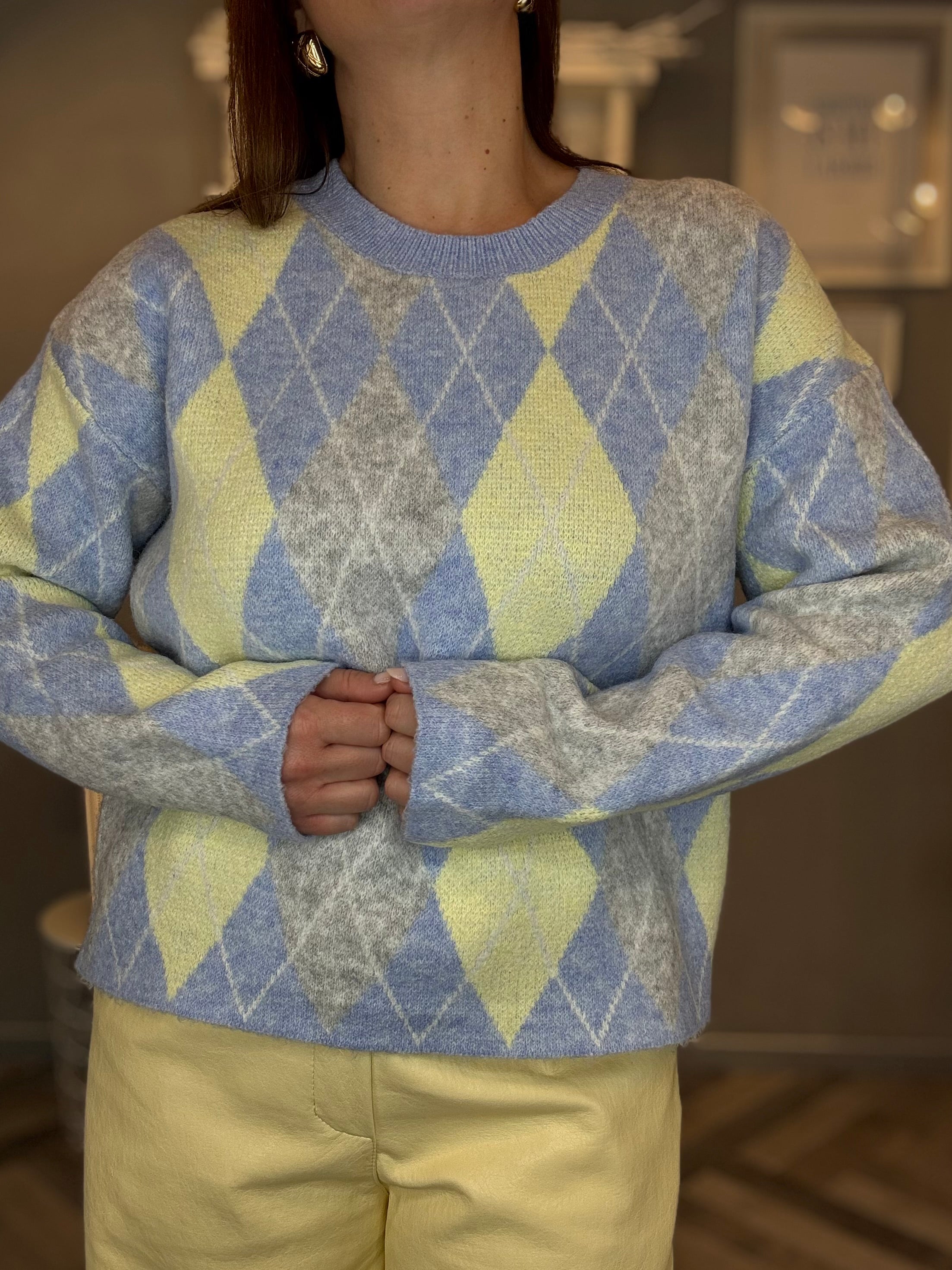 Maglione celeste con rombi