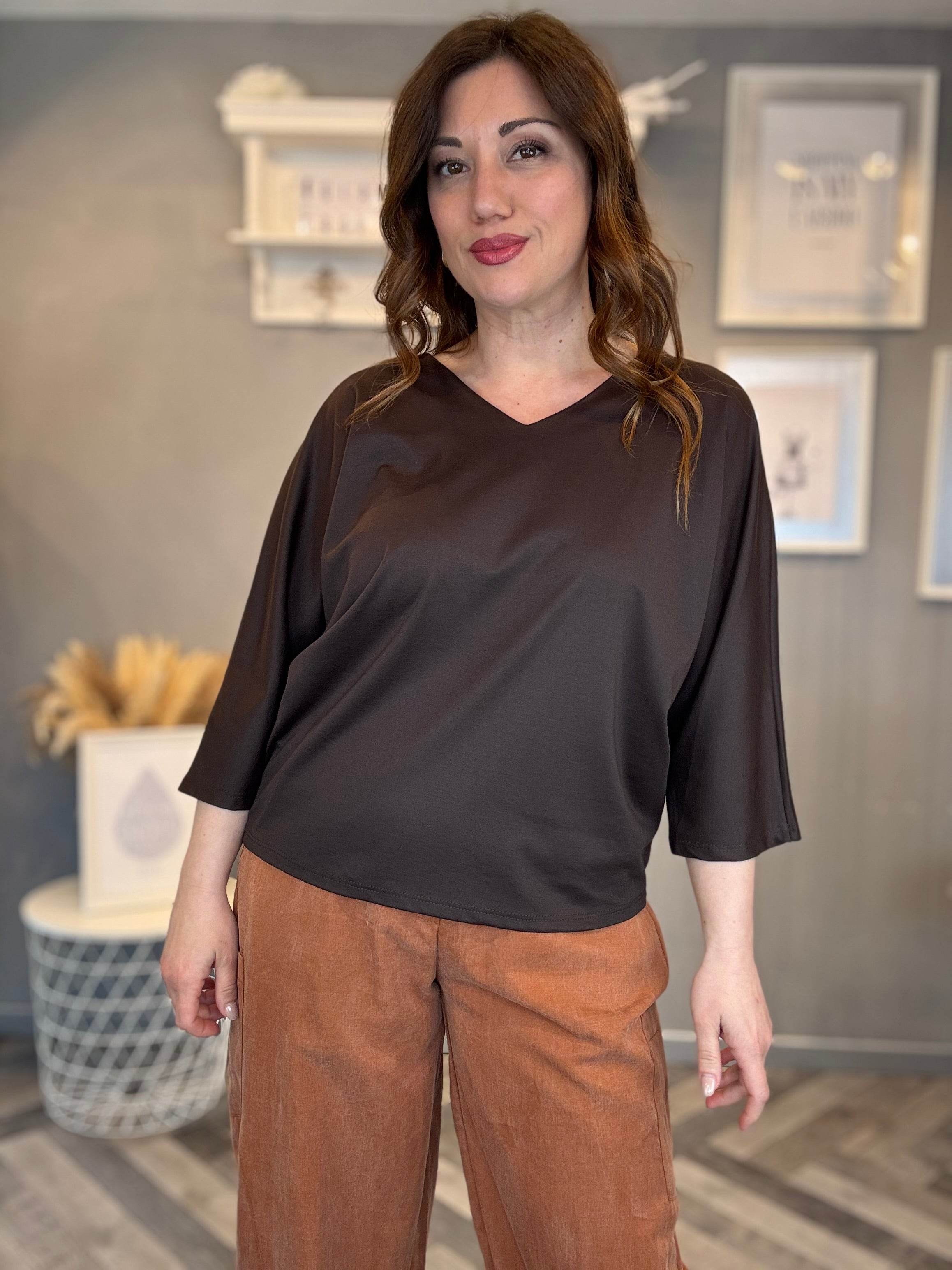 Maglia con fiocco sul retro moro