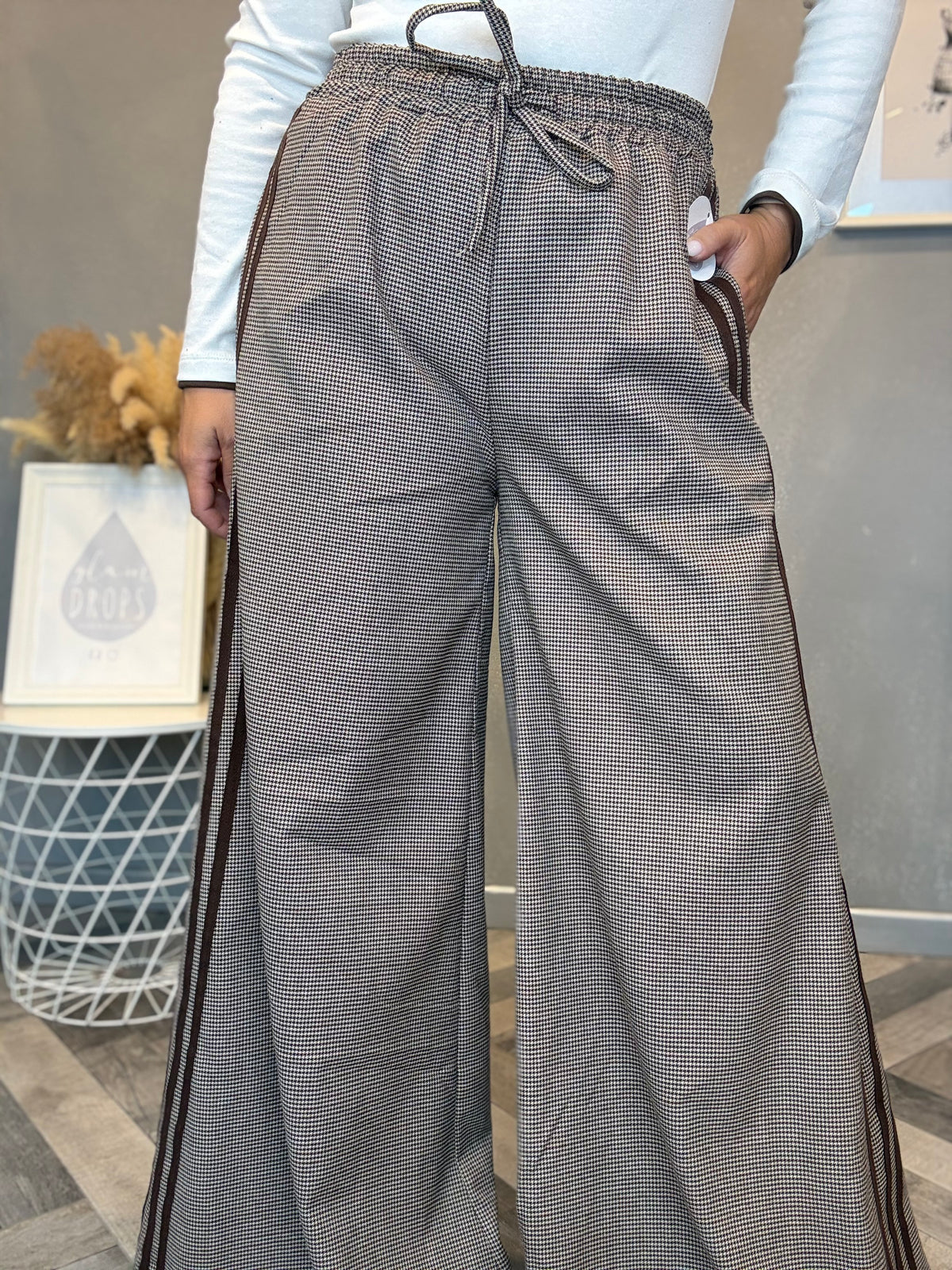 Pantalone palazzo check con bande laterali