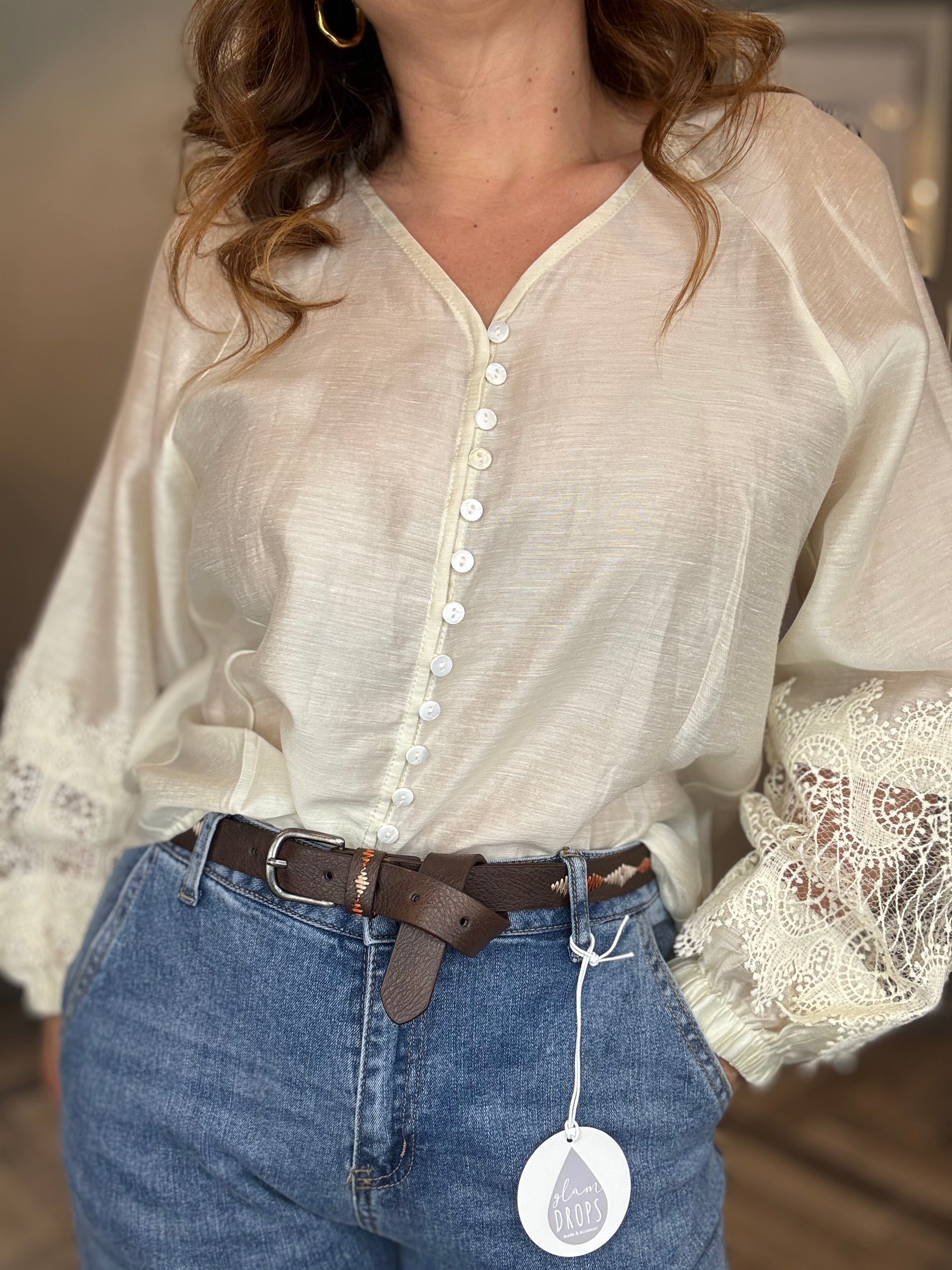 Jeans con cintura ricamata
