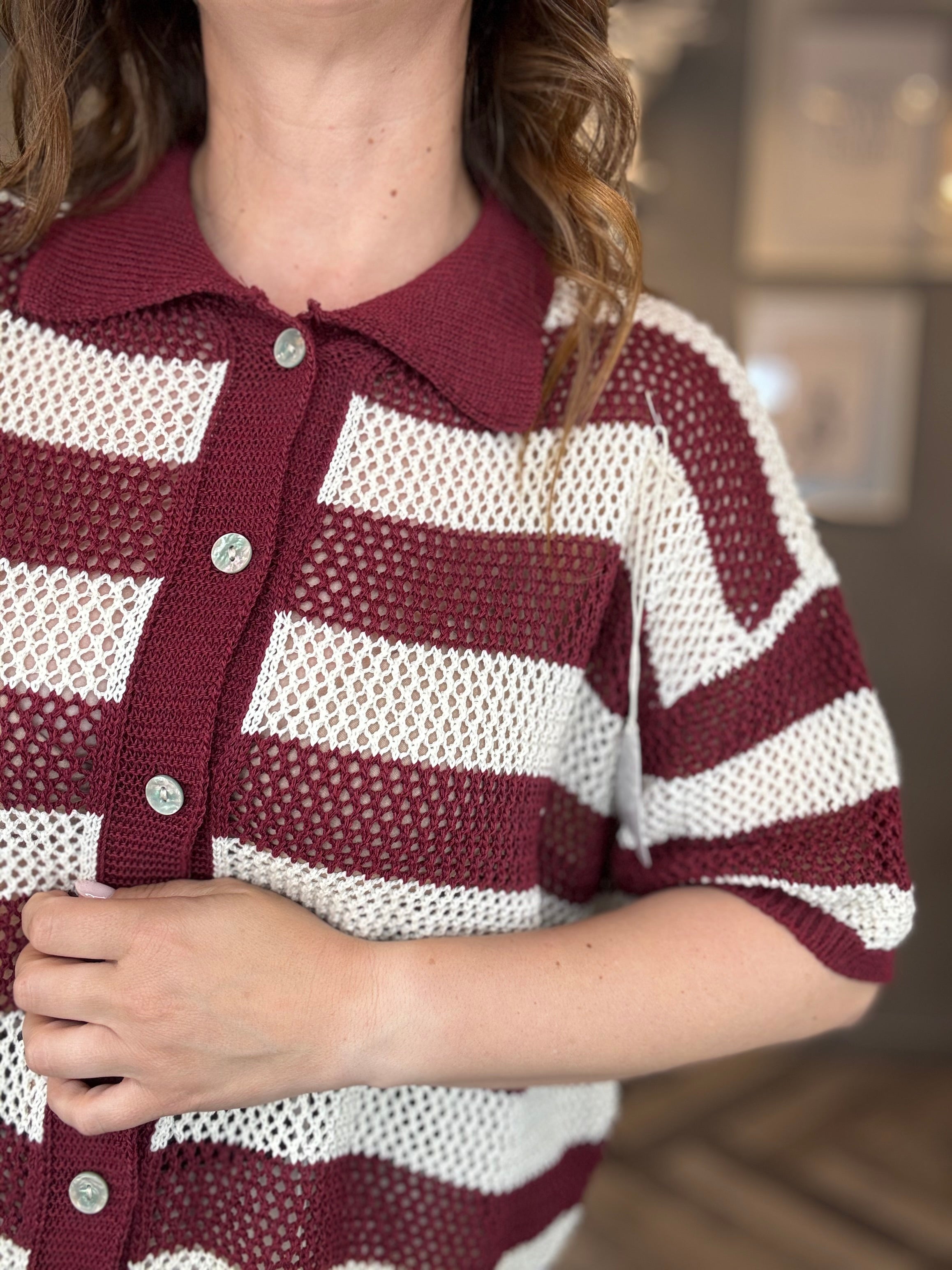 Polo traforata righe bordeaux