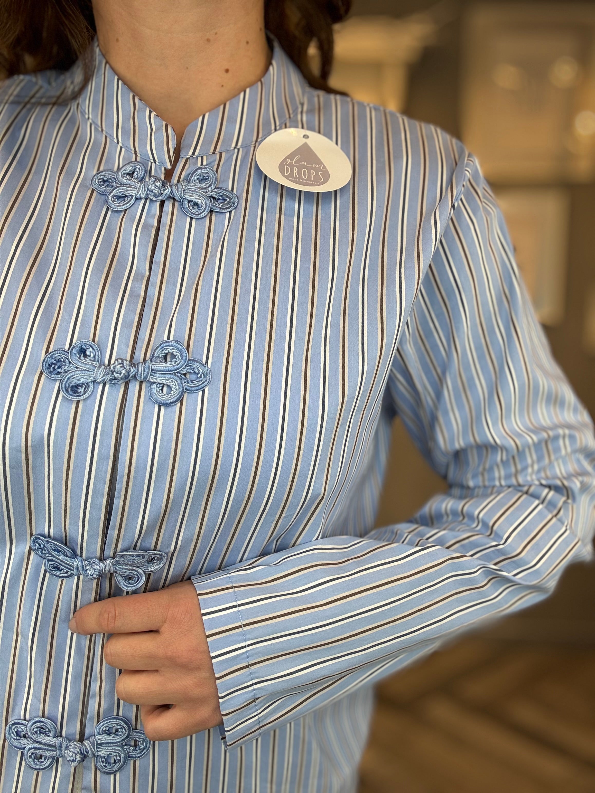 Camicia alamari celeste a righe