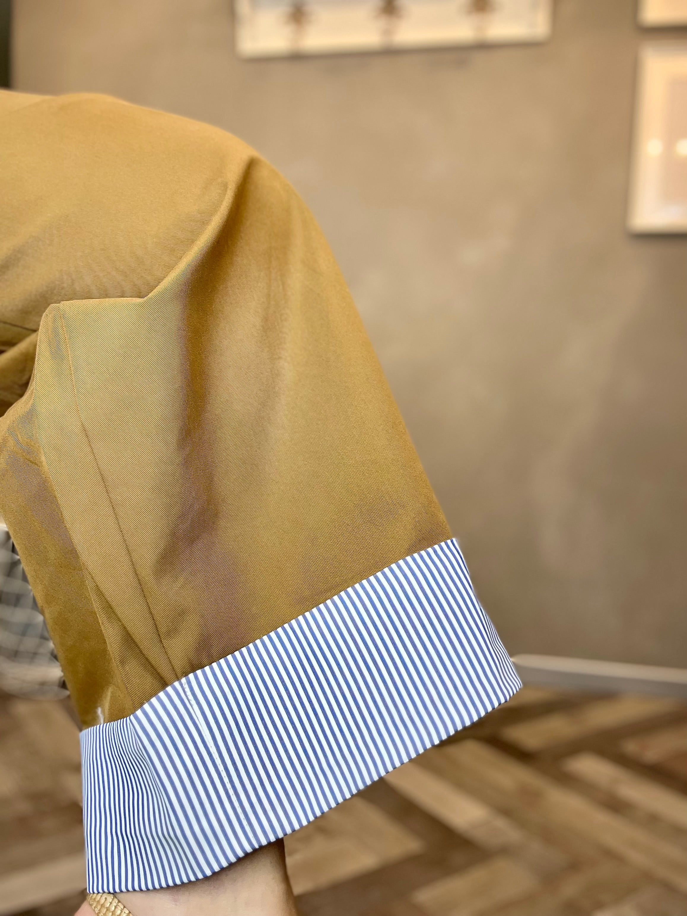 Pantalone wide leg con risvolto a righe