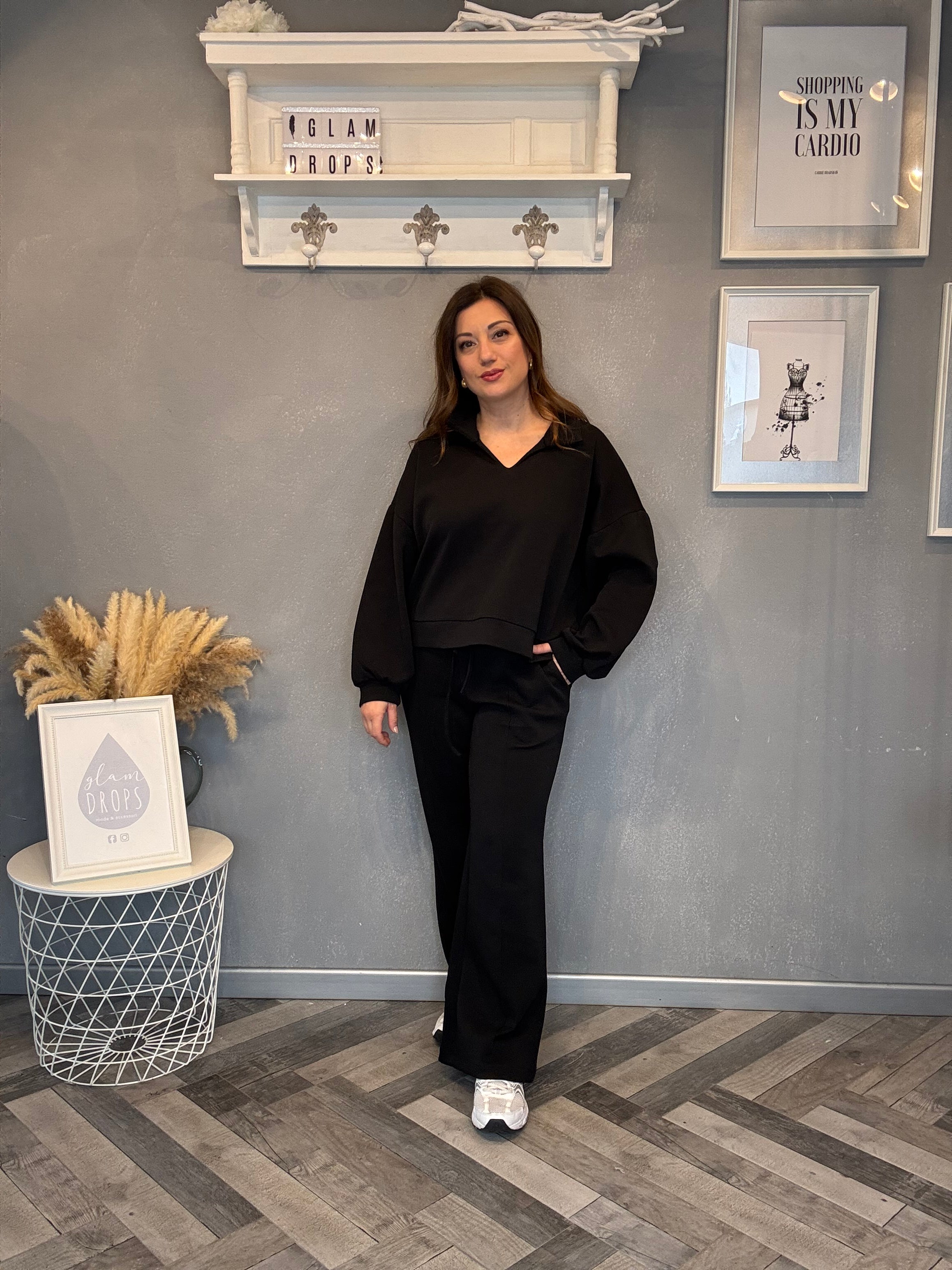 Tuta polo chic nera
