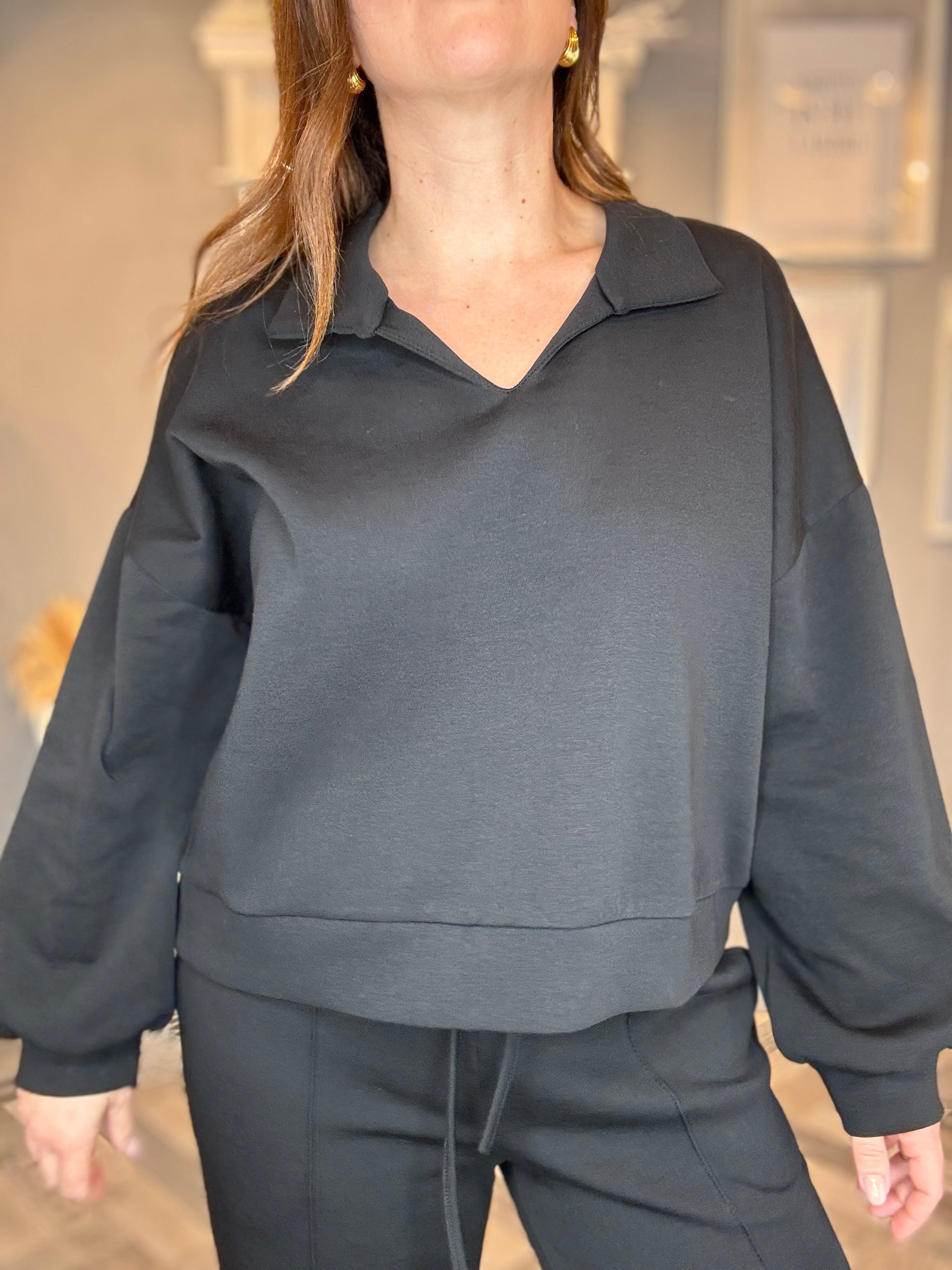 Tuta polo chic nera