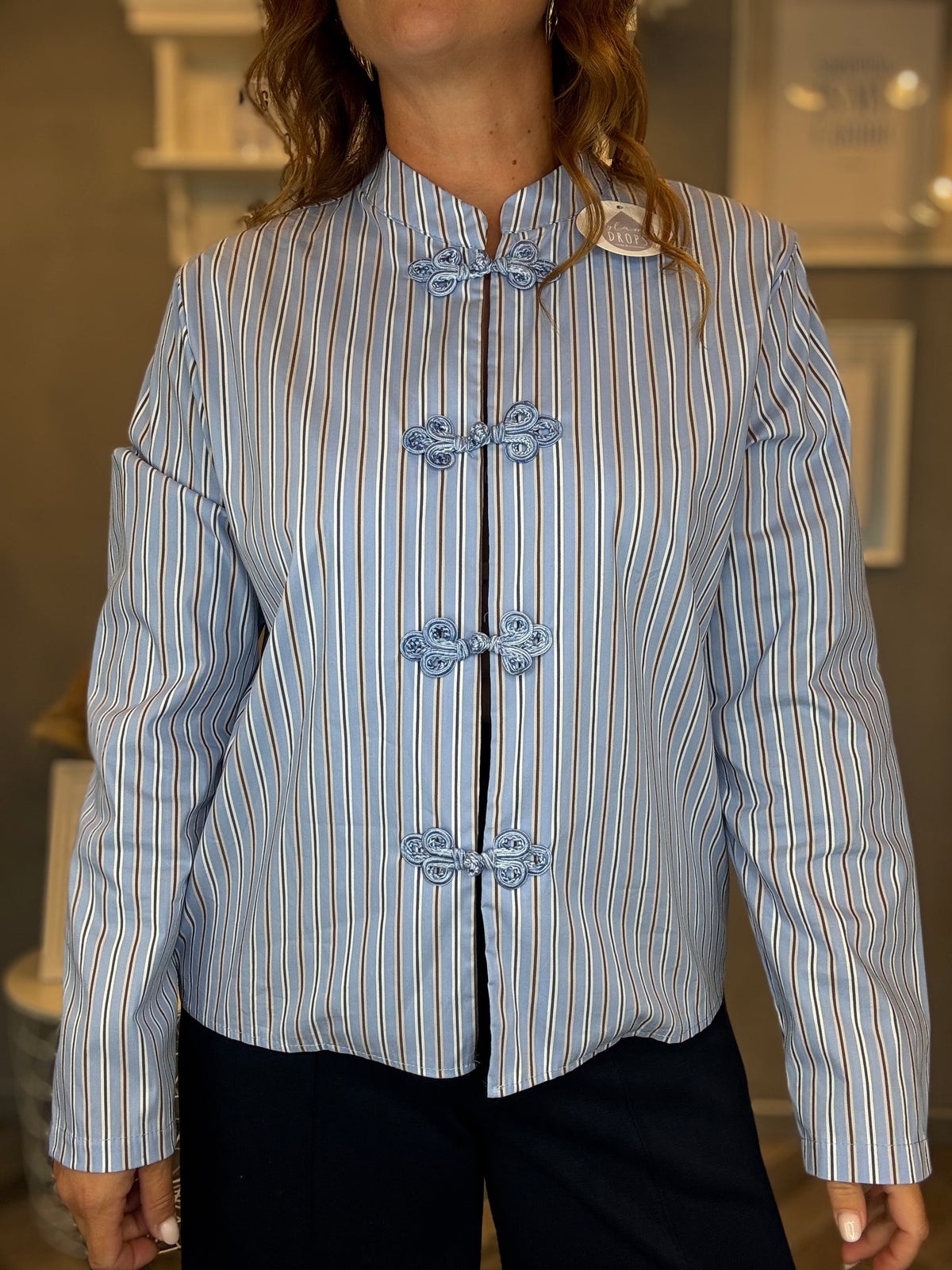 Camicia alamari celeste a righe