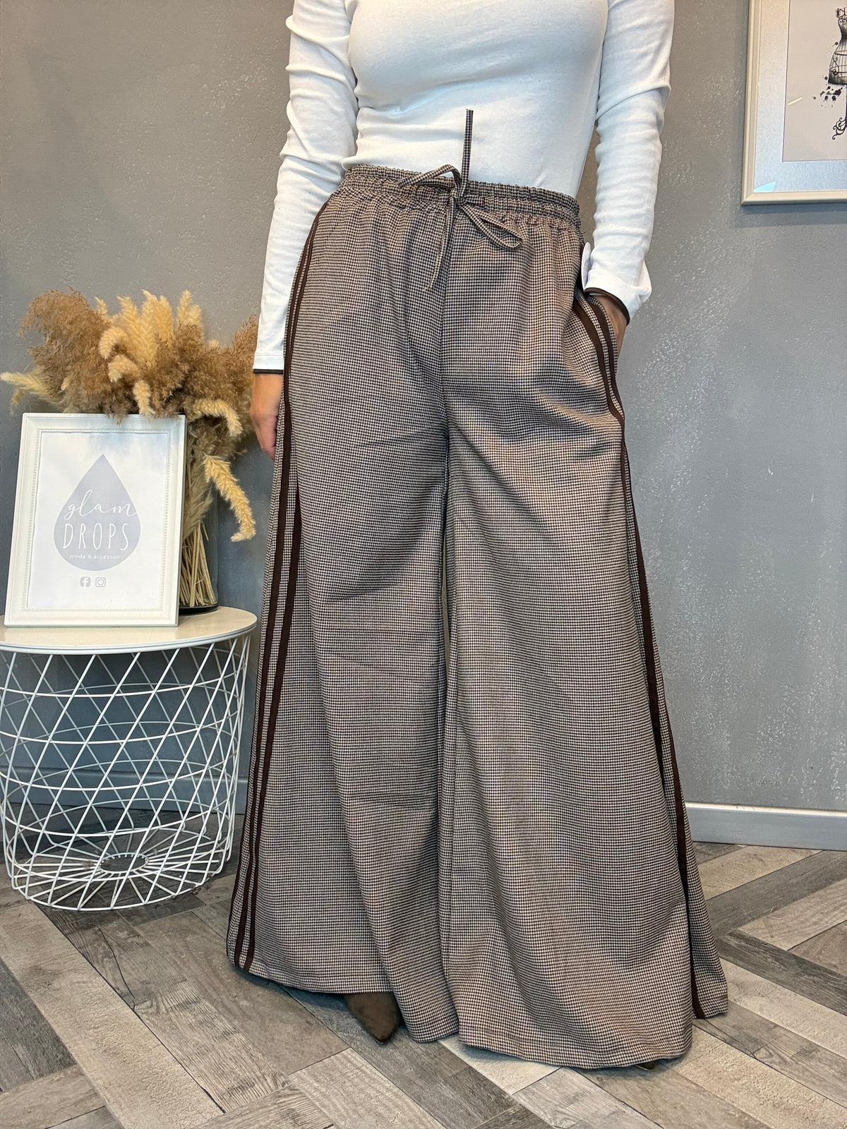 Pantalone palazzo check con bande laterali
