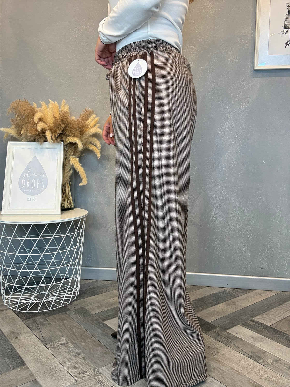 Pantalone palazzo check con bande laterali