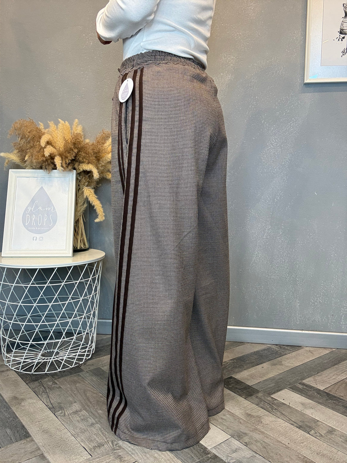 Pantalone palazzo check con bande laterali