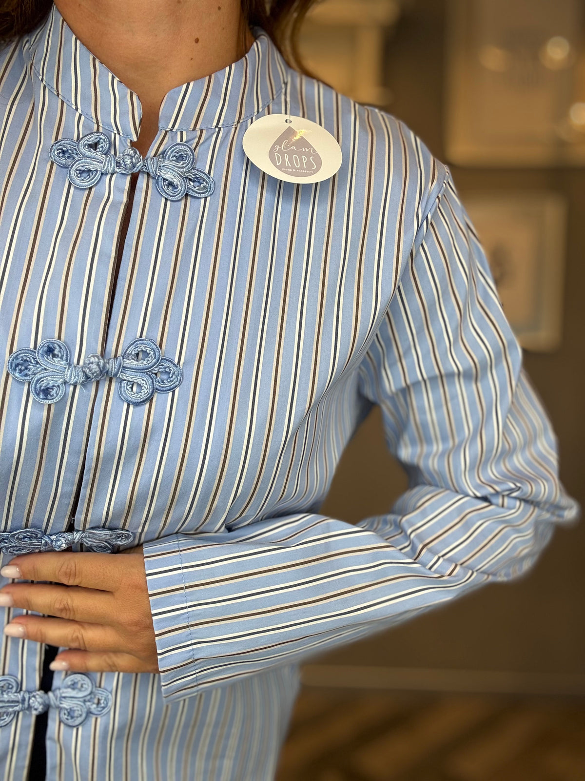 Camicia alamari celeste a righe