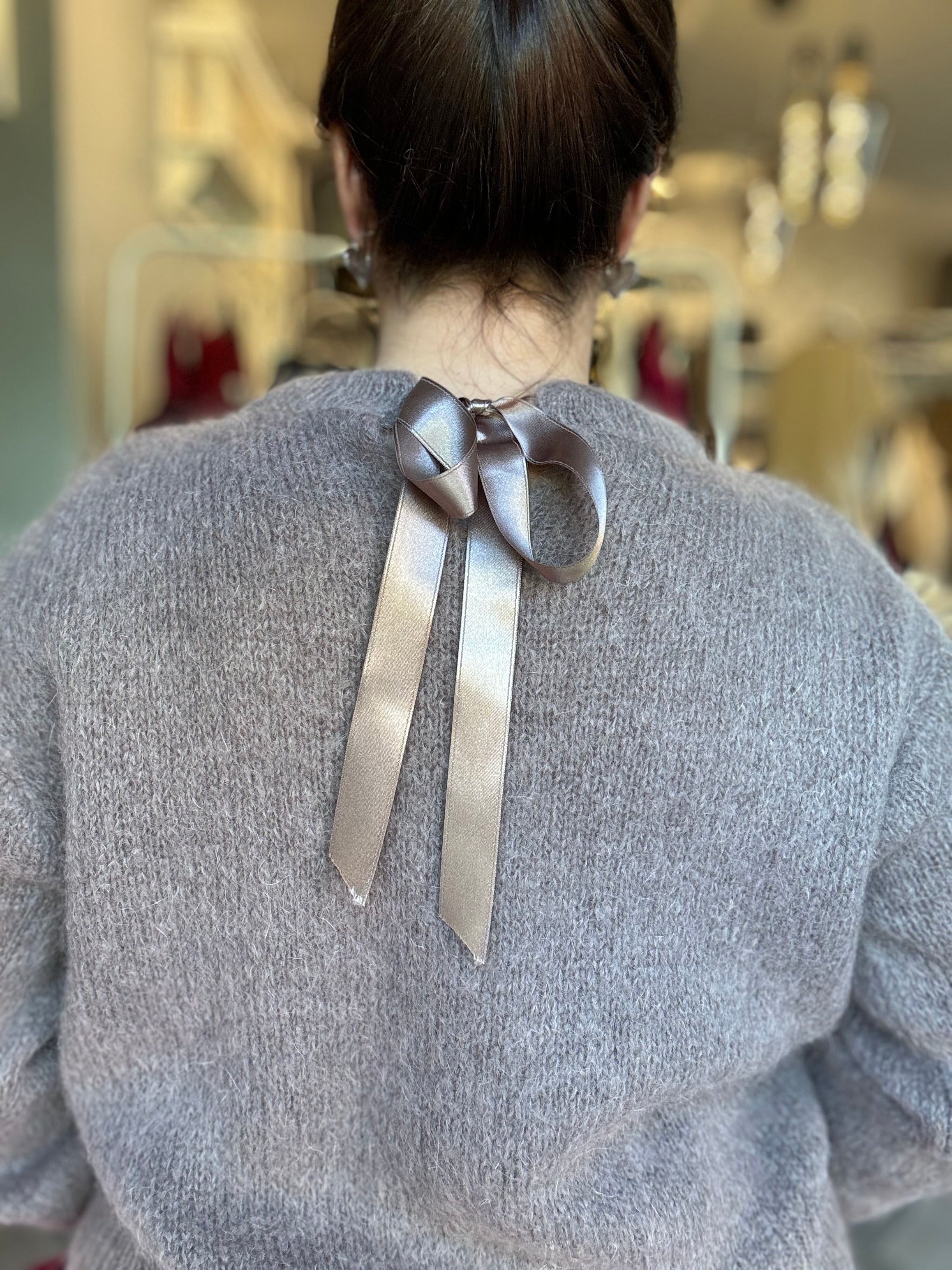 Maglione in mohair con fiocco decorativo sul retro