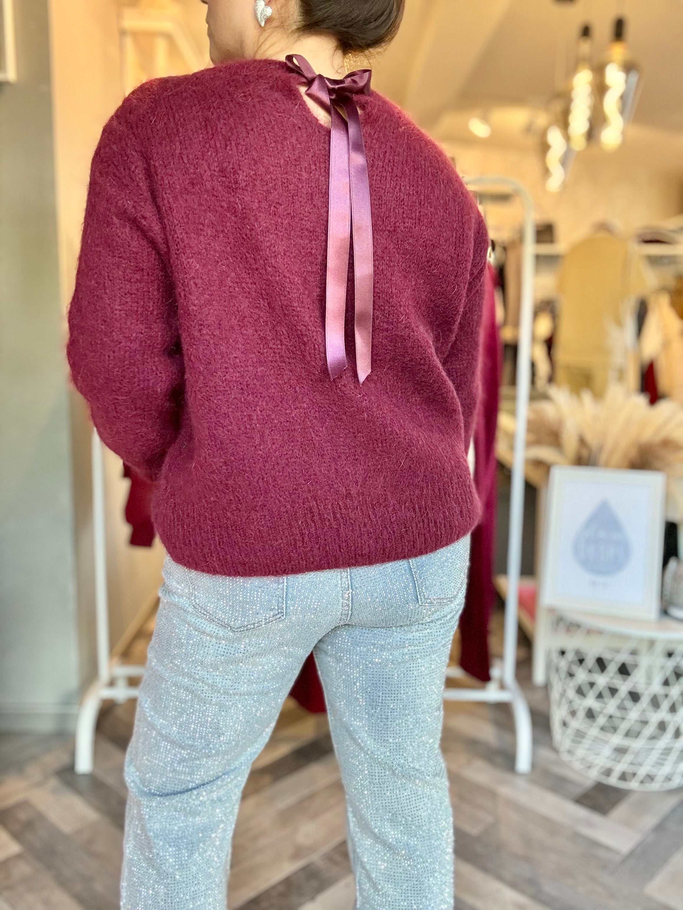 Maglione in mohair con fiocco decorativo sul retro